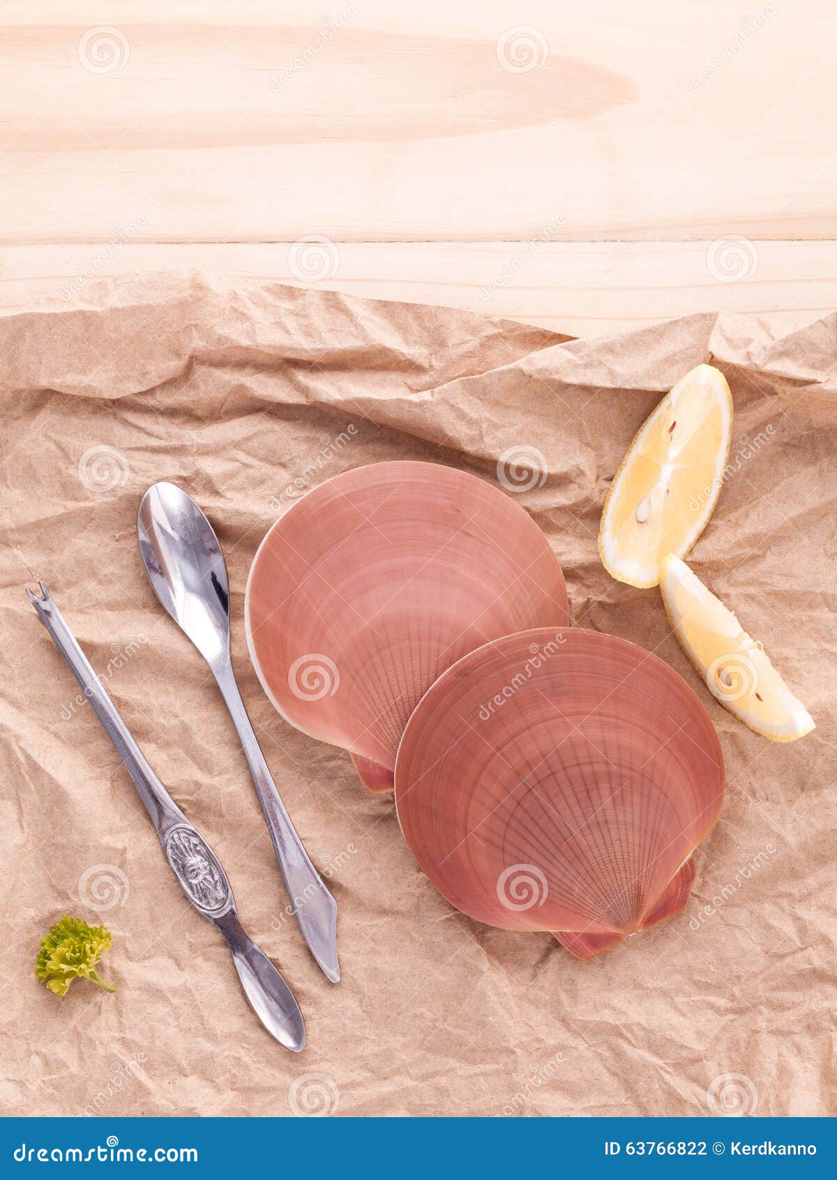 Raw Queen Scallops with Lemon Slice ,fork and Spoon Preparing for Grill