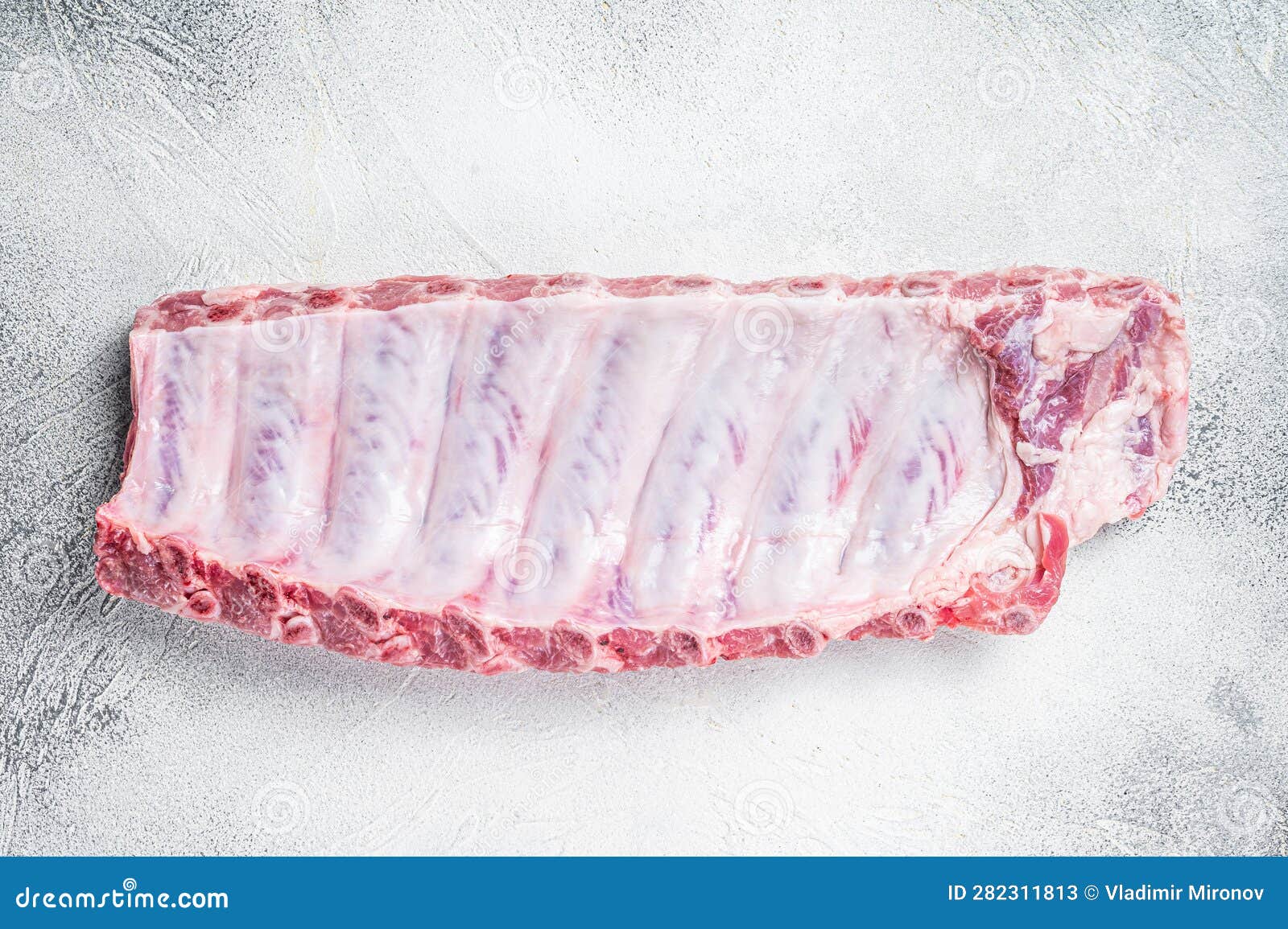 Raw Rack of Pork Spare Ribs. White Background. Top View Stock Image