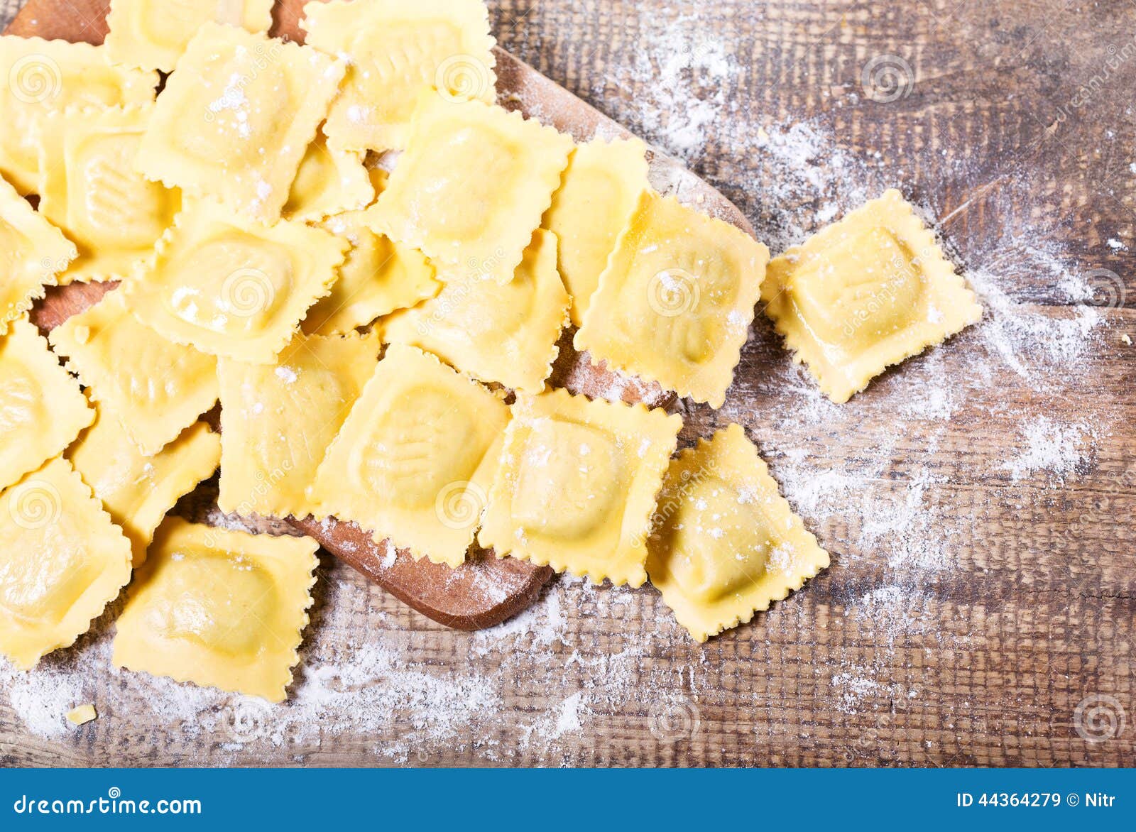Raw ravioli with flour stock image. Image of flour, homemade - 44364279