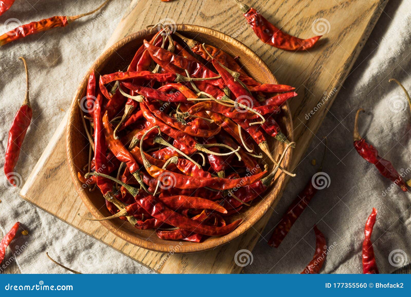 raw red organic chile de arbol peppers