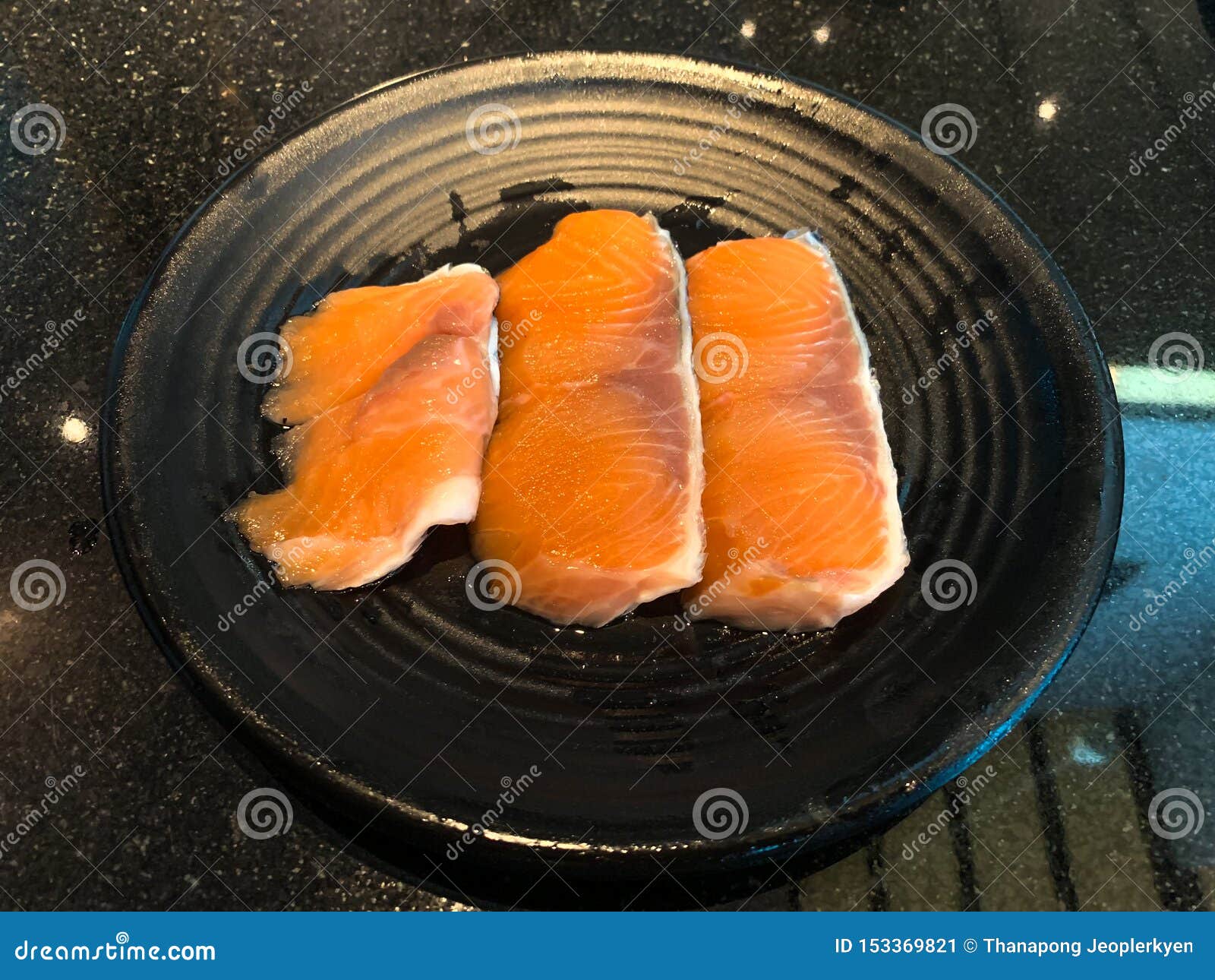 Raw Salmon Filet on Black Dish in Restaurant Stock Image Image of