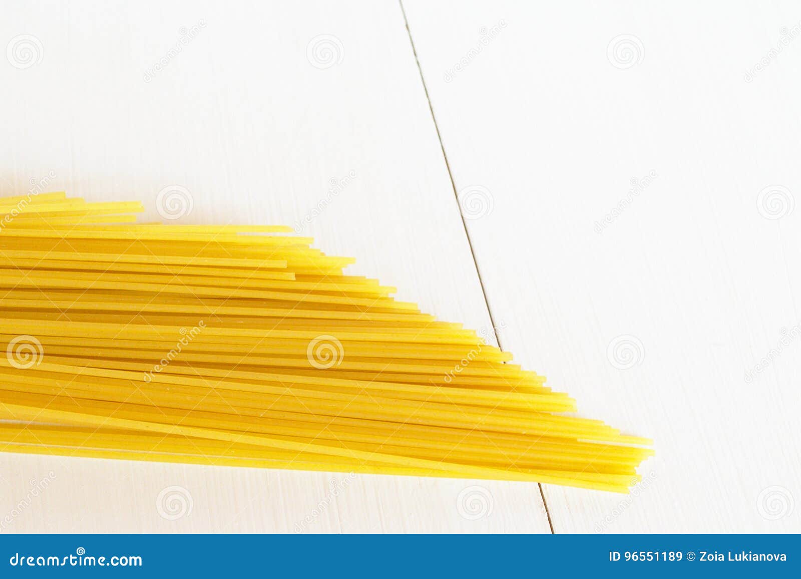 raw spaghetti on a white background