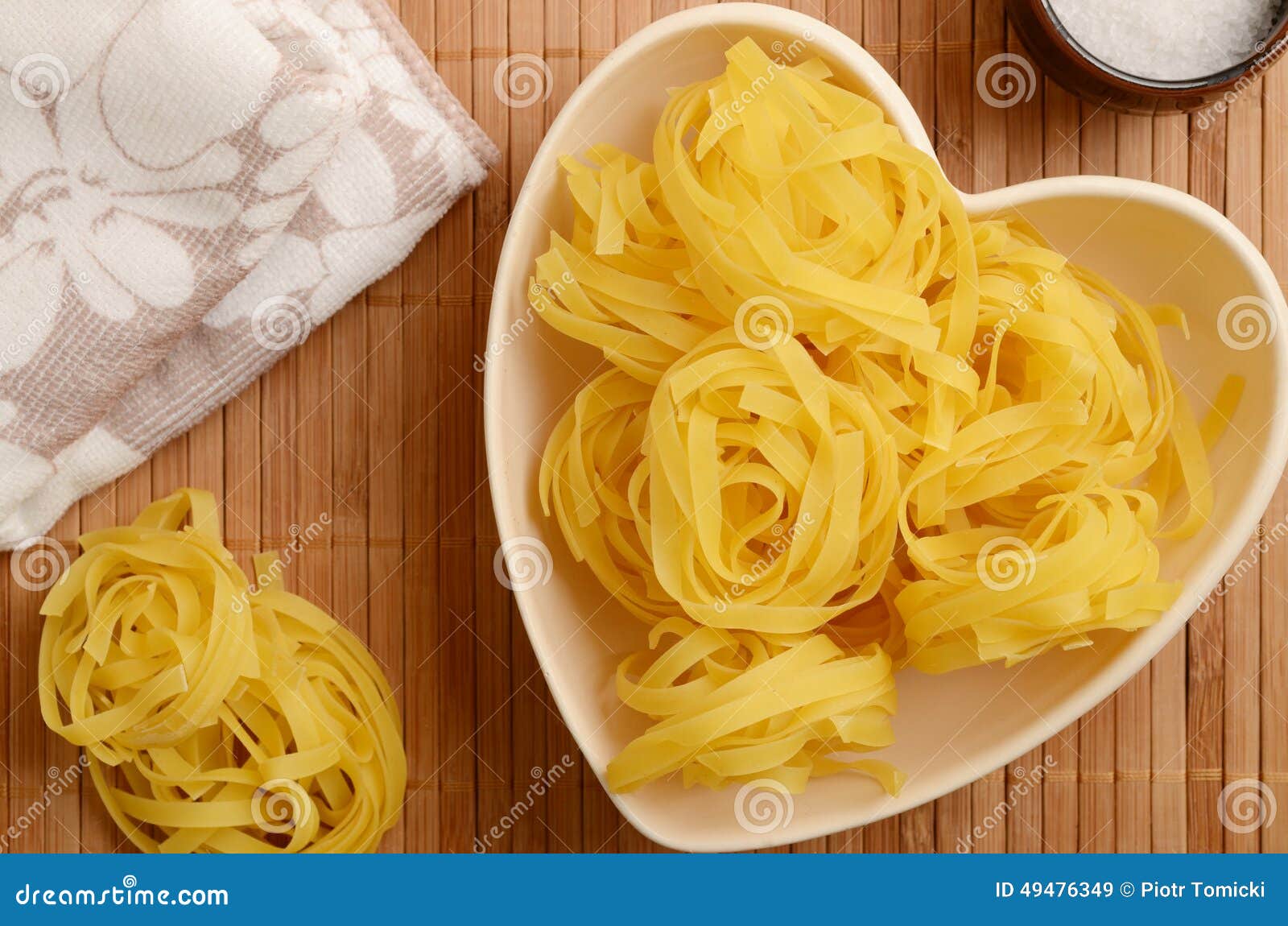 Raw Tagliatelle in a Heart Shaped Bowl Stock Image Image of noodles