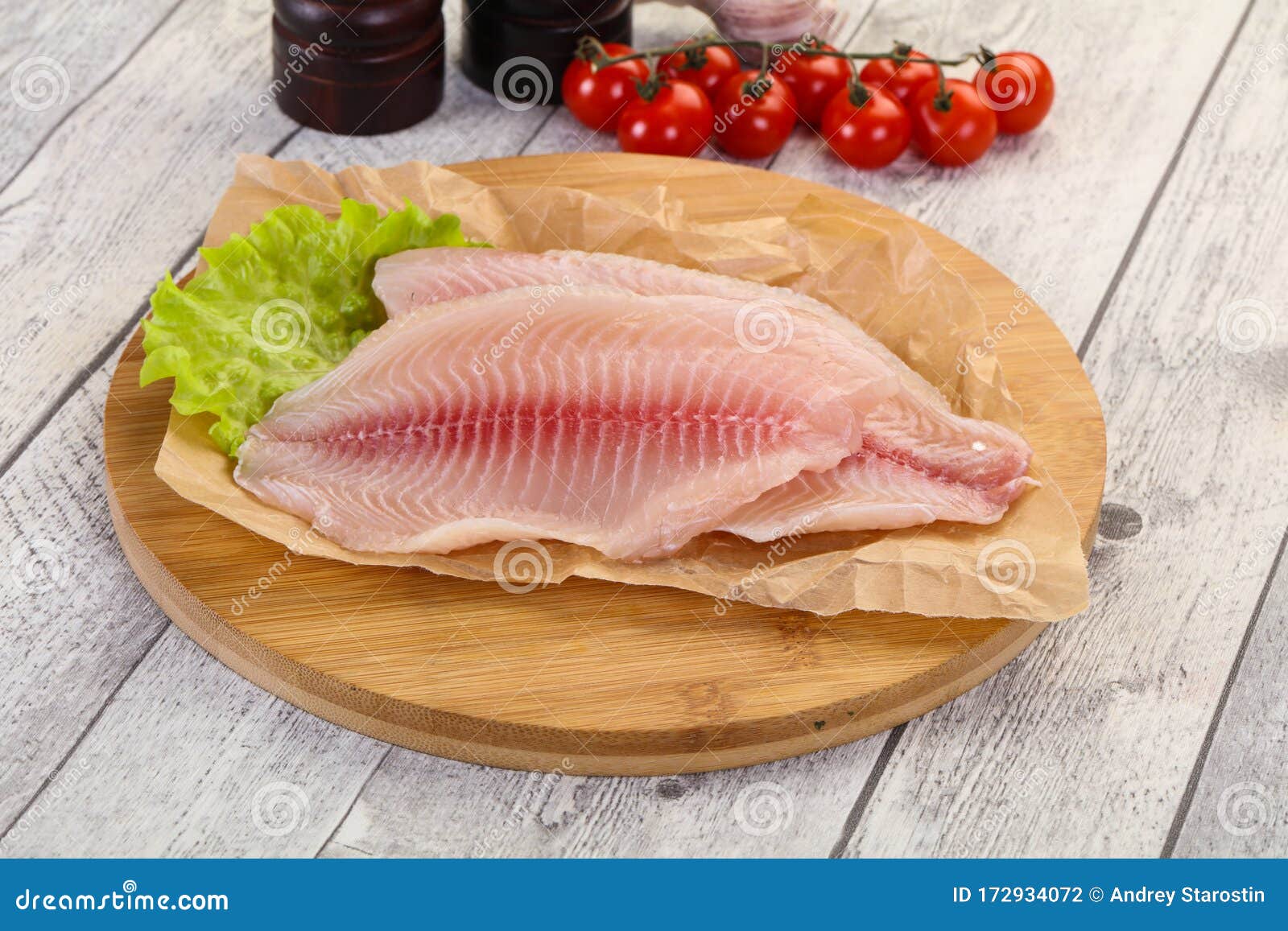 Raw tilapia fish stock photo. Image of kitchen, board 172934072