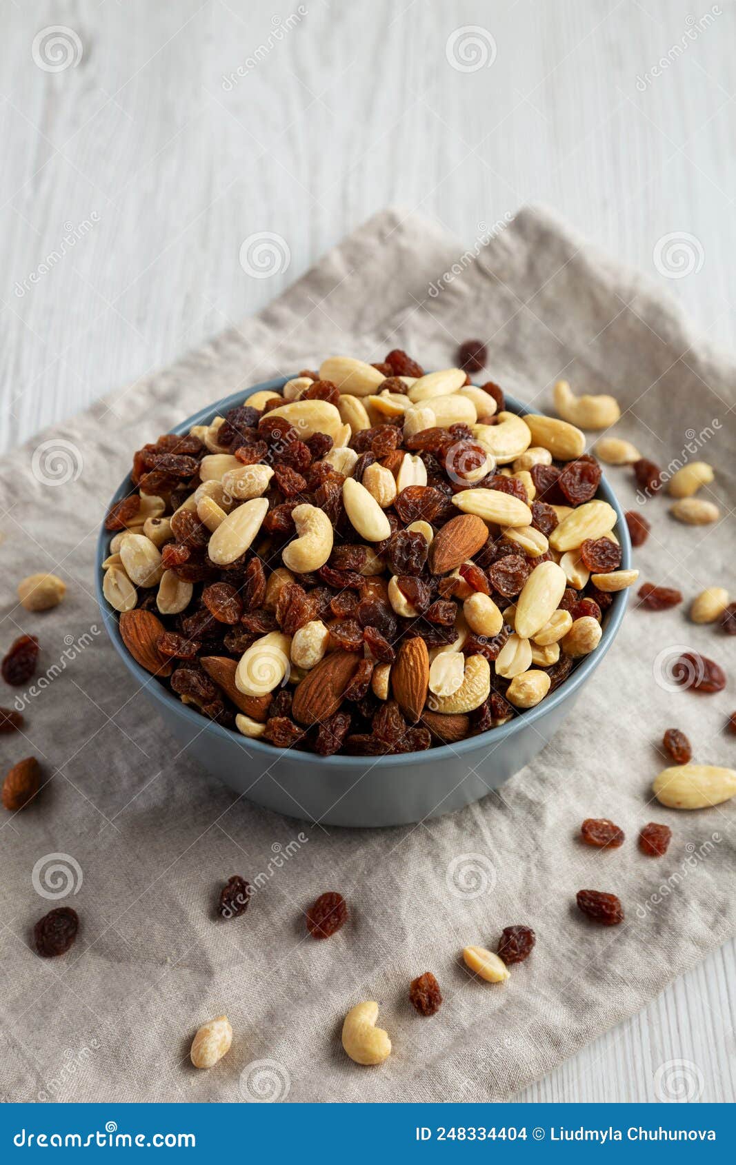 Raw Trail Mix with Nuts and Fruits in a Bowl, Side View Stock Photo