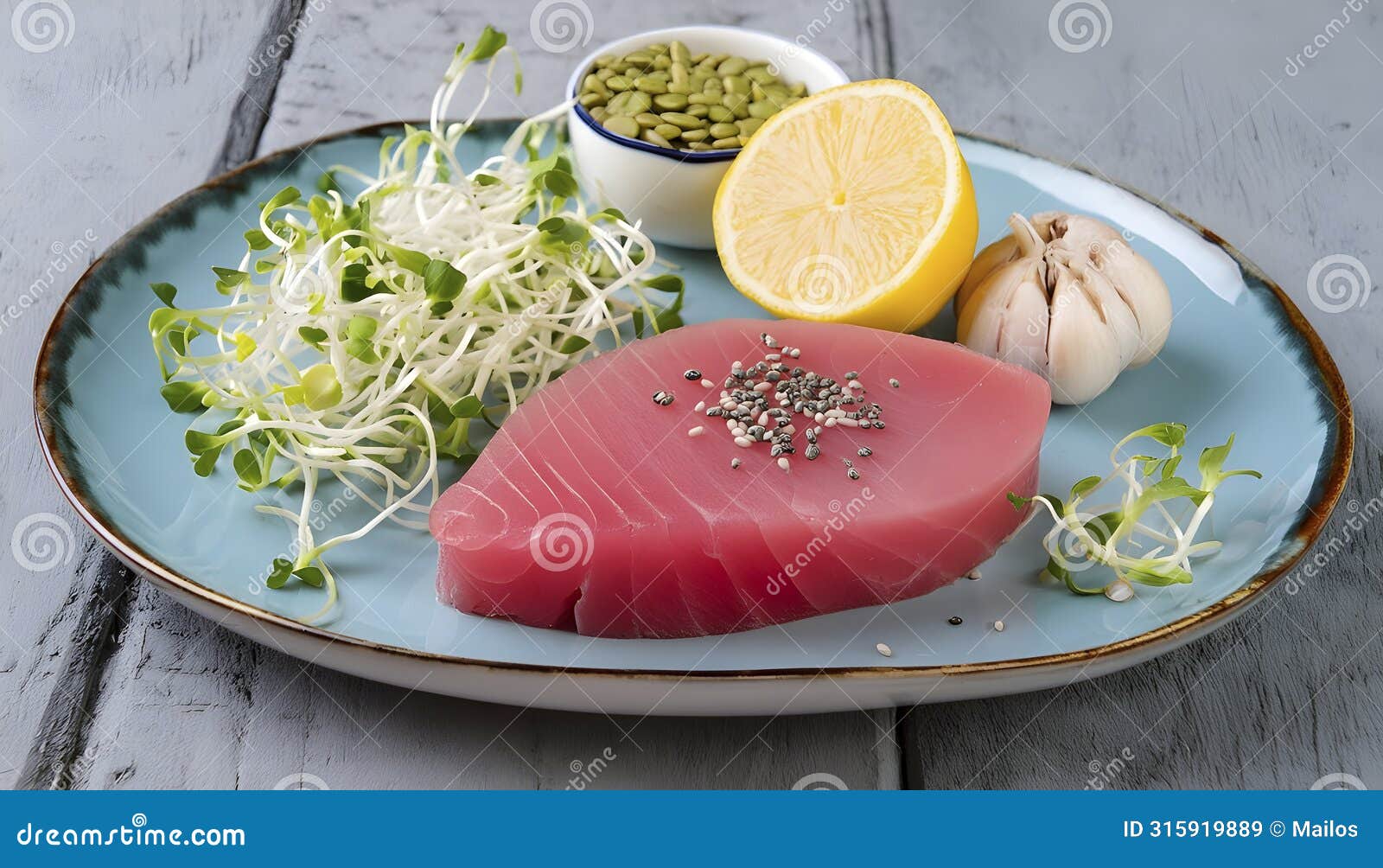 raw tuna steak with zesty lemon and cracked pepper.