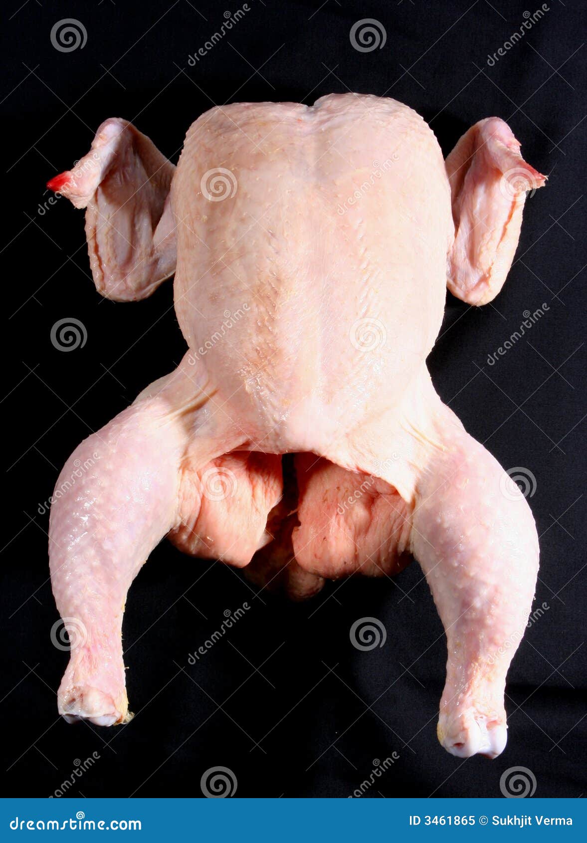 raw uncooked chicken on black