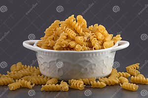 Raw Uncooked Spiral Pasta In Bowl Raw Pasta Macaroni Dry Spiral Raw Uncooked Spiral Pasta In Bowl Raw Pasta Macaroni Dry Spiral