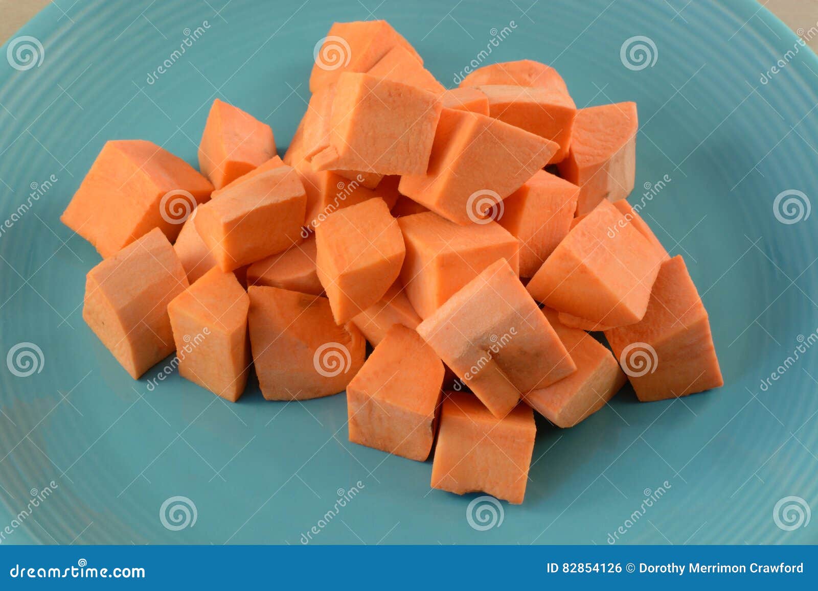 Raw uncooked yam cubes stock photo. Image of uncooked 82854126