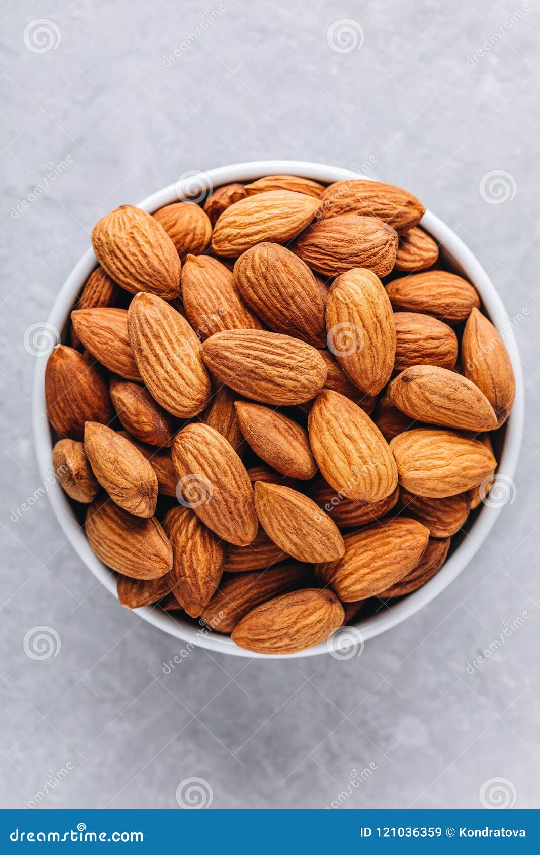 Raw whole almond in bowl stock image. Image of nature 121036359
