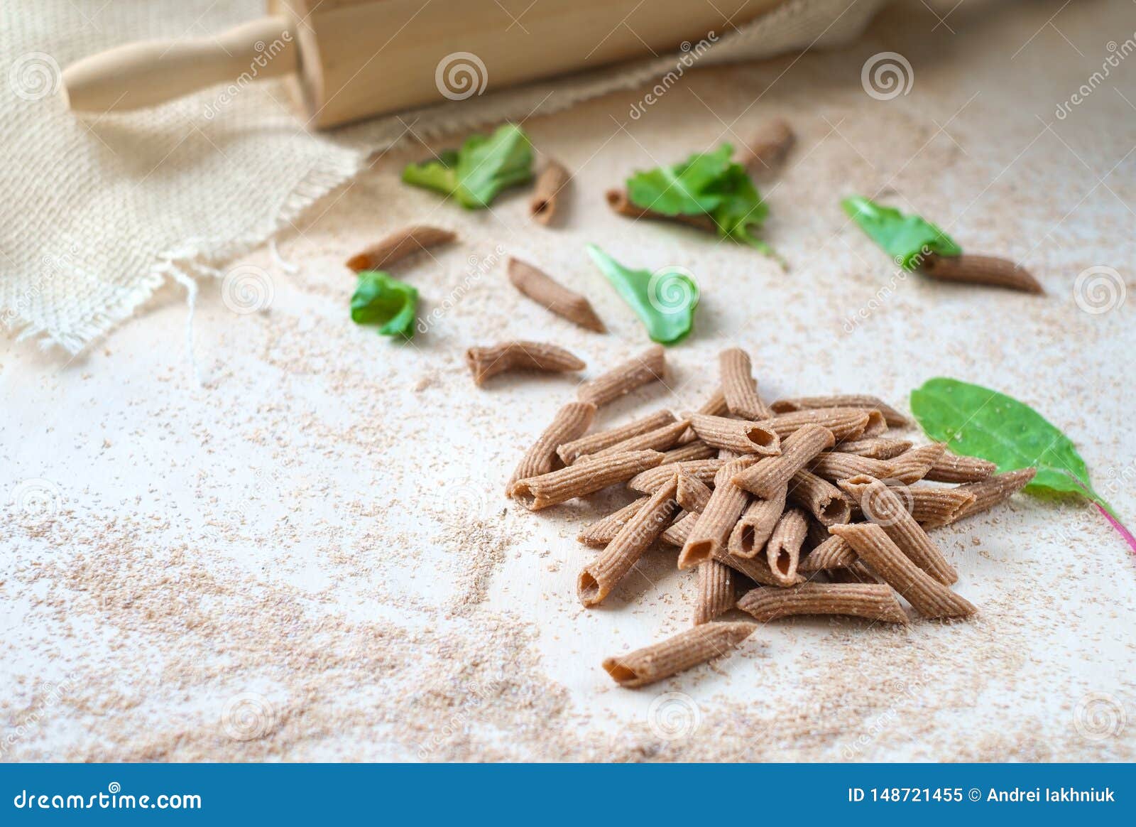 Raw Wholegrain Pasta Homemade on the Table with Flour Stock Image