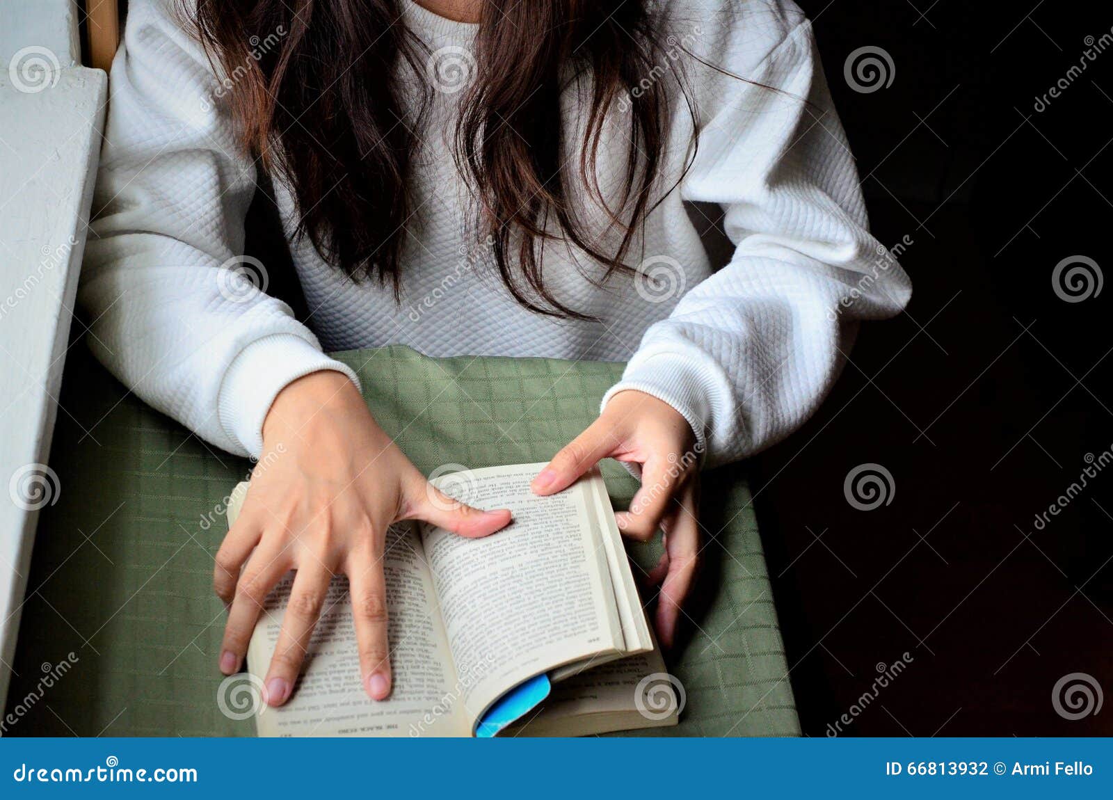 Reading a pocket book stock photo. Image of open, learning 66813932