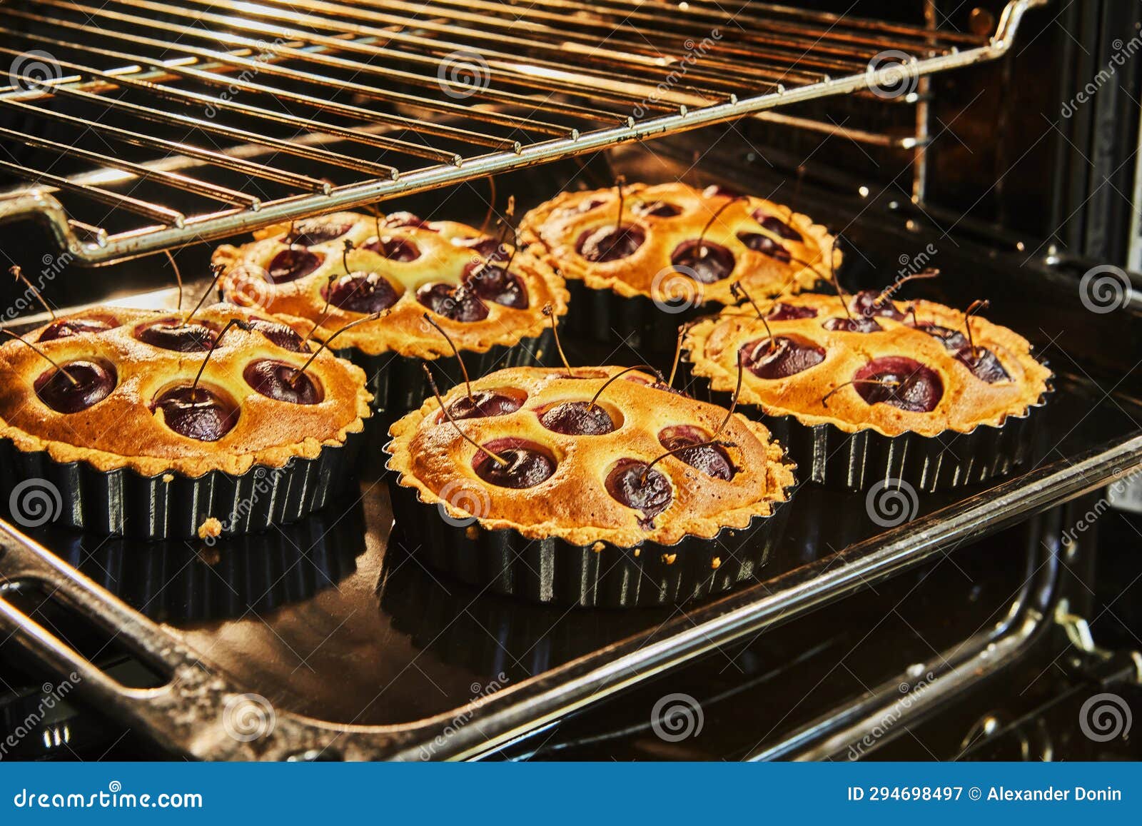 Readymade Cherry Pie in Large and Small Form after Baking in an Electric Oven Stock Image