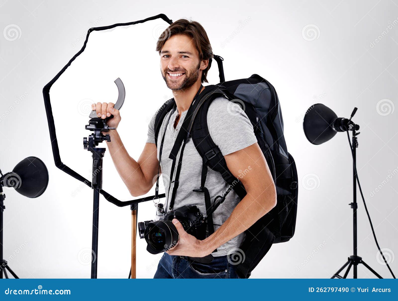 Ready for the Shoot. a Professional Photographer with His Equipment