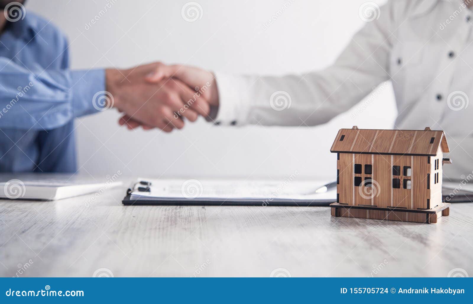 Real Estate Agent with Customer in Office. Real Estate Concept Stock