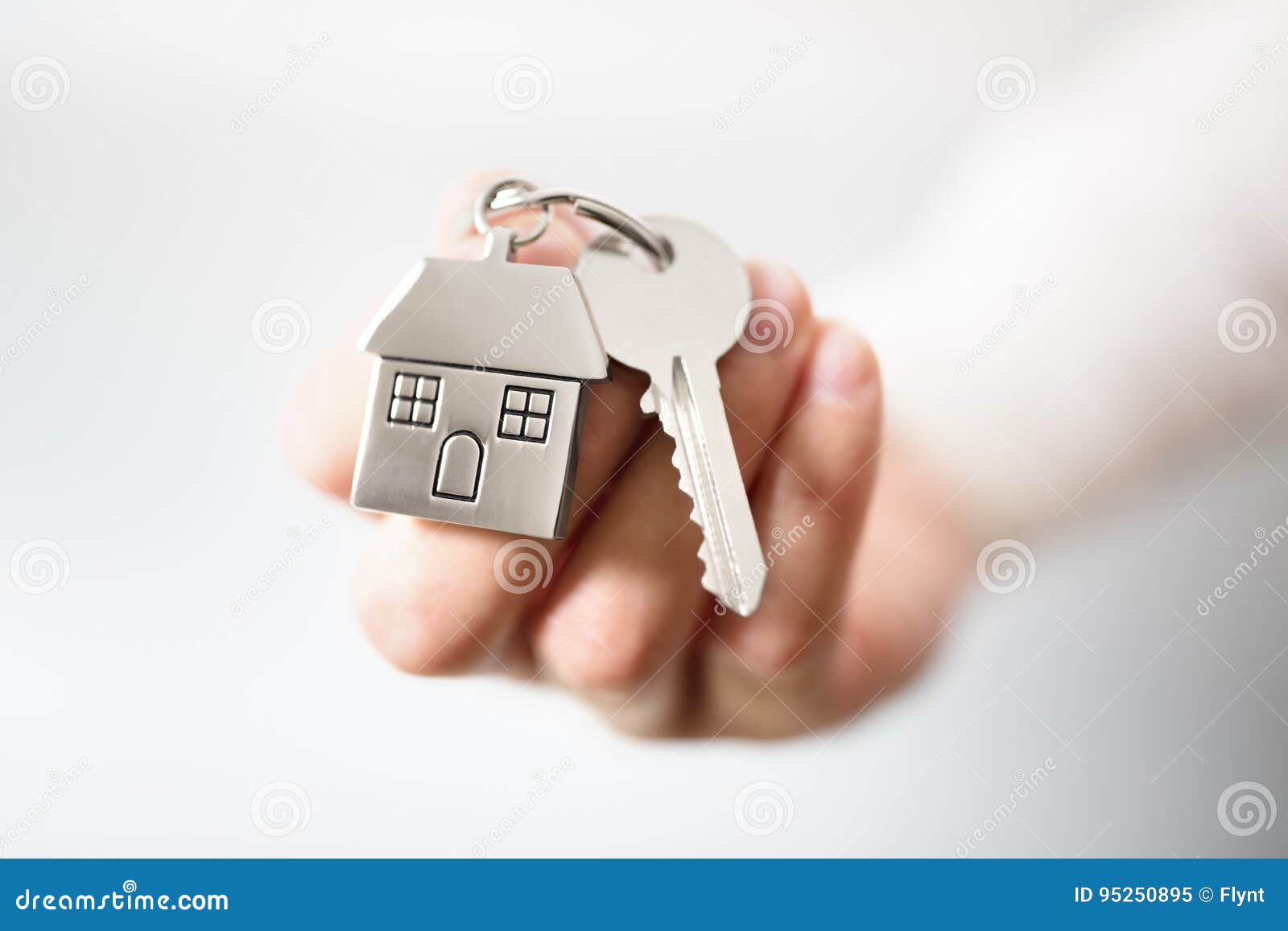 real estate agent giving house keys