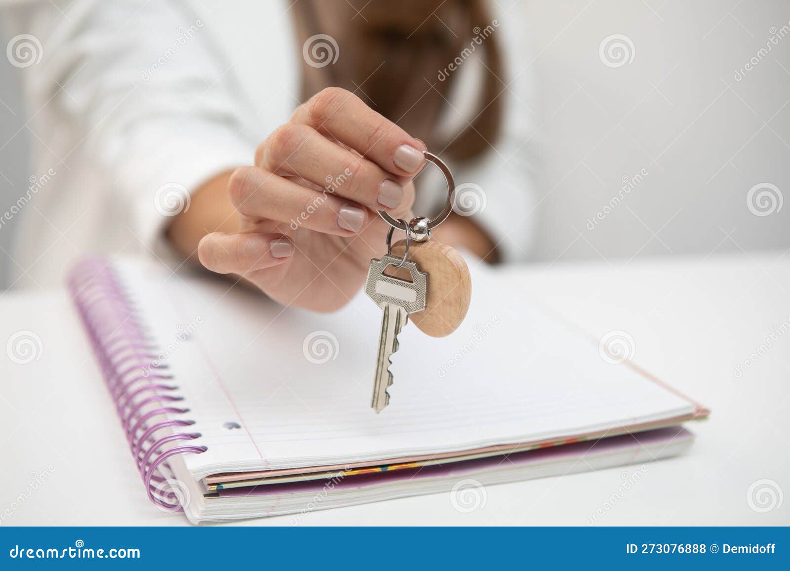 real estate agent holding key