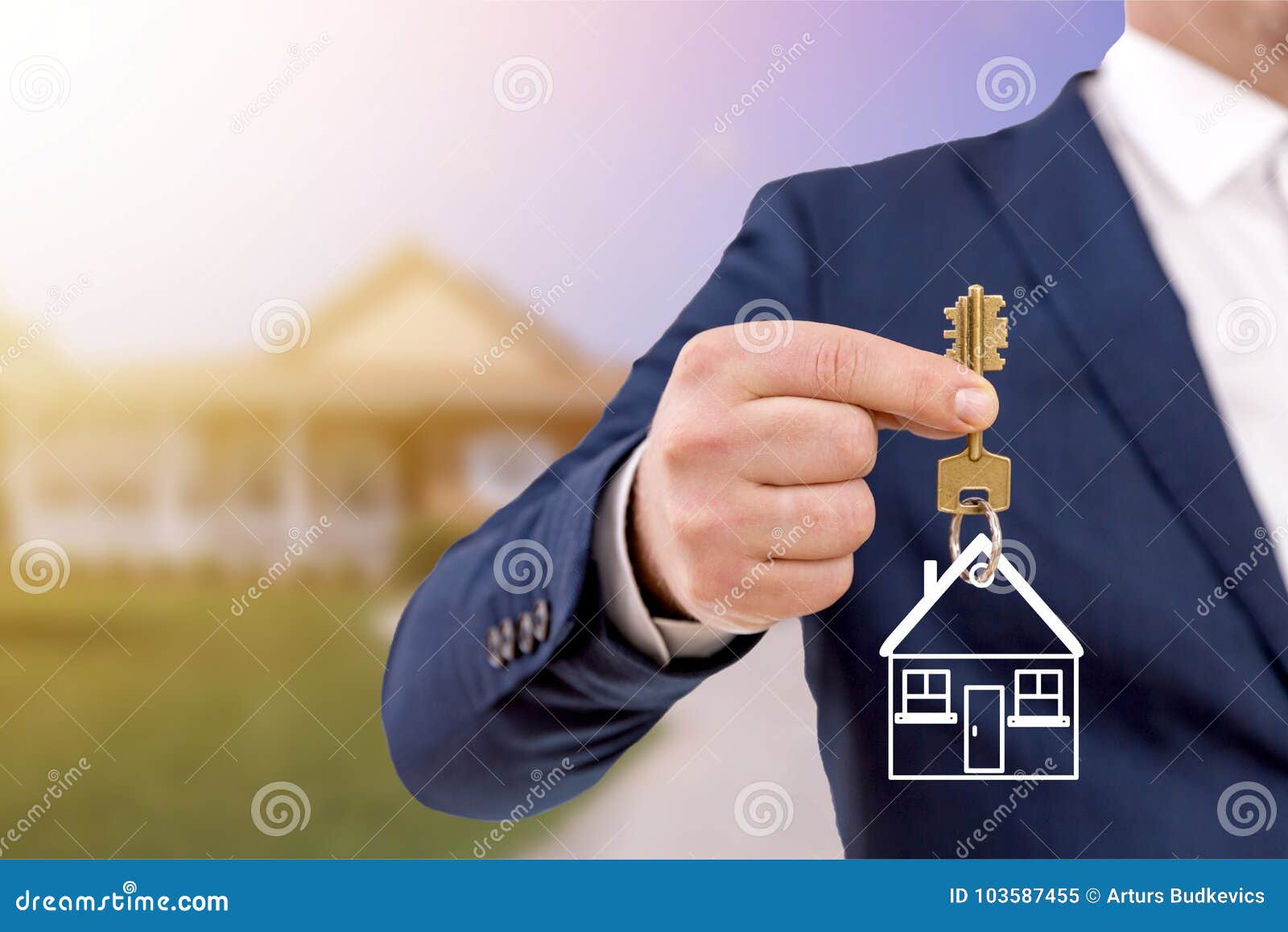 real estate agent holding keys