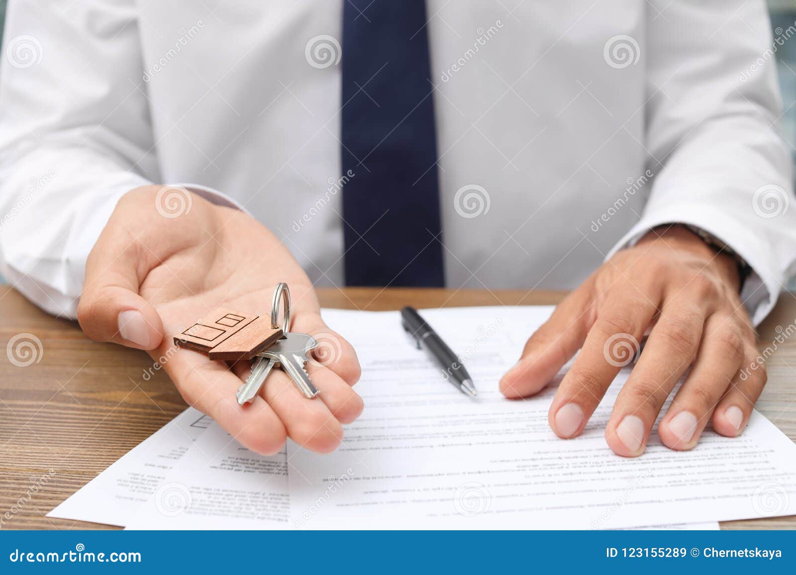 Real Estate Agent with Keys and Documents Stock Image Image of