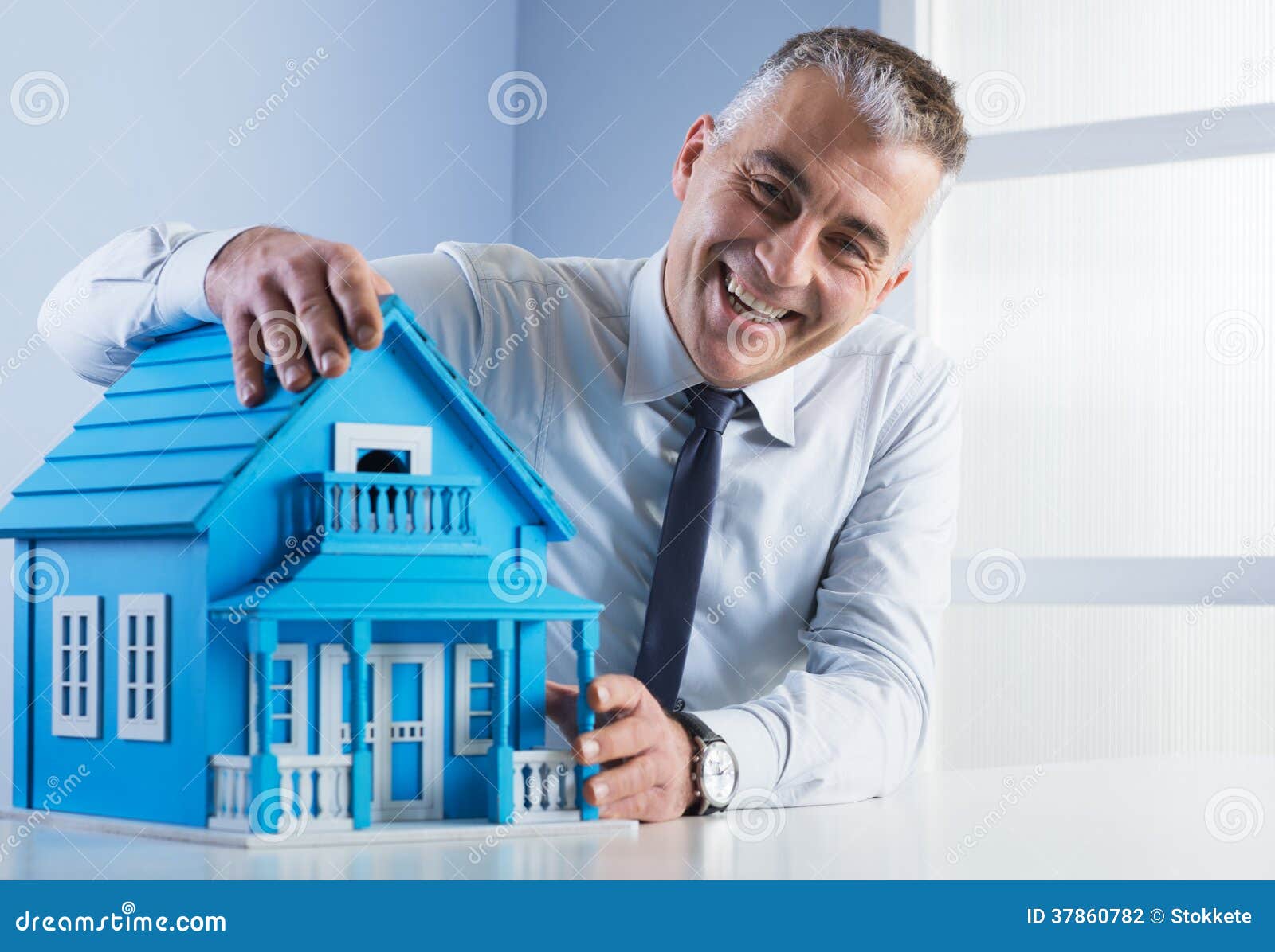 Real Estate Agent with Model House Stock Photo Image of happy, agent