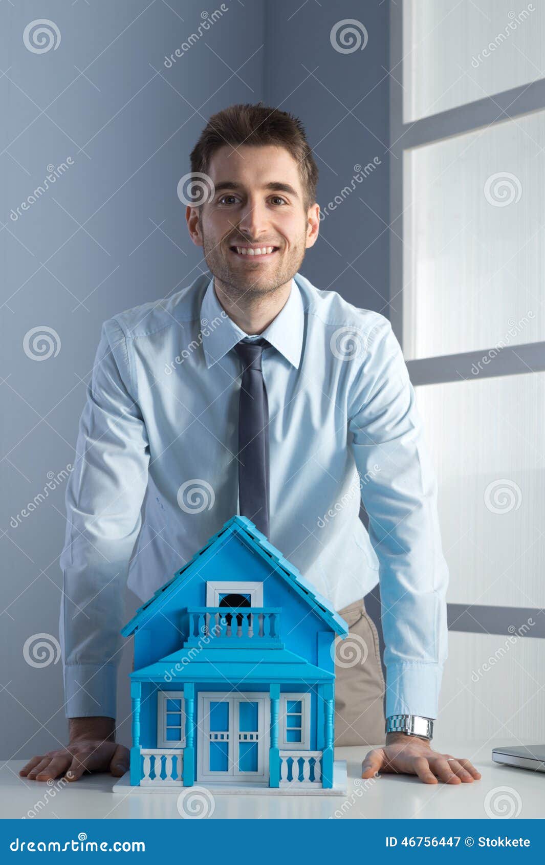 Real Estate Agent with Model House Stock Image Image of people