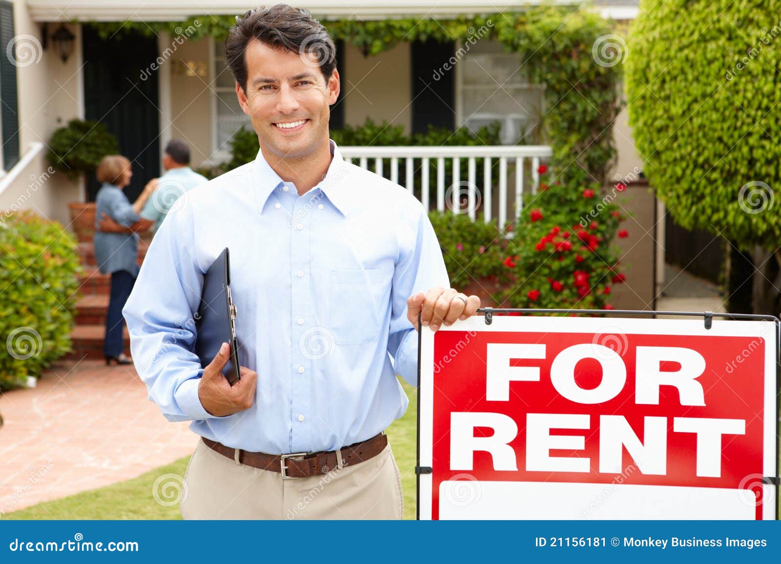 real estate agent at work outside a property