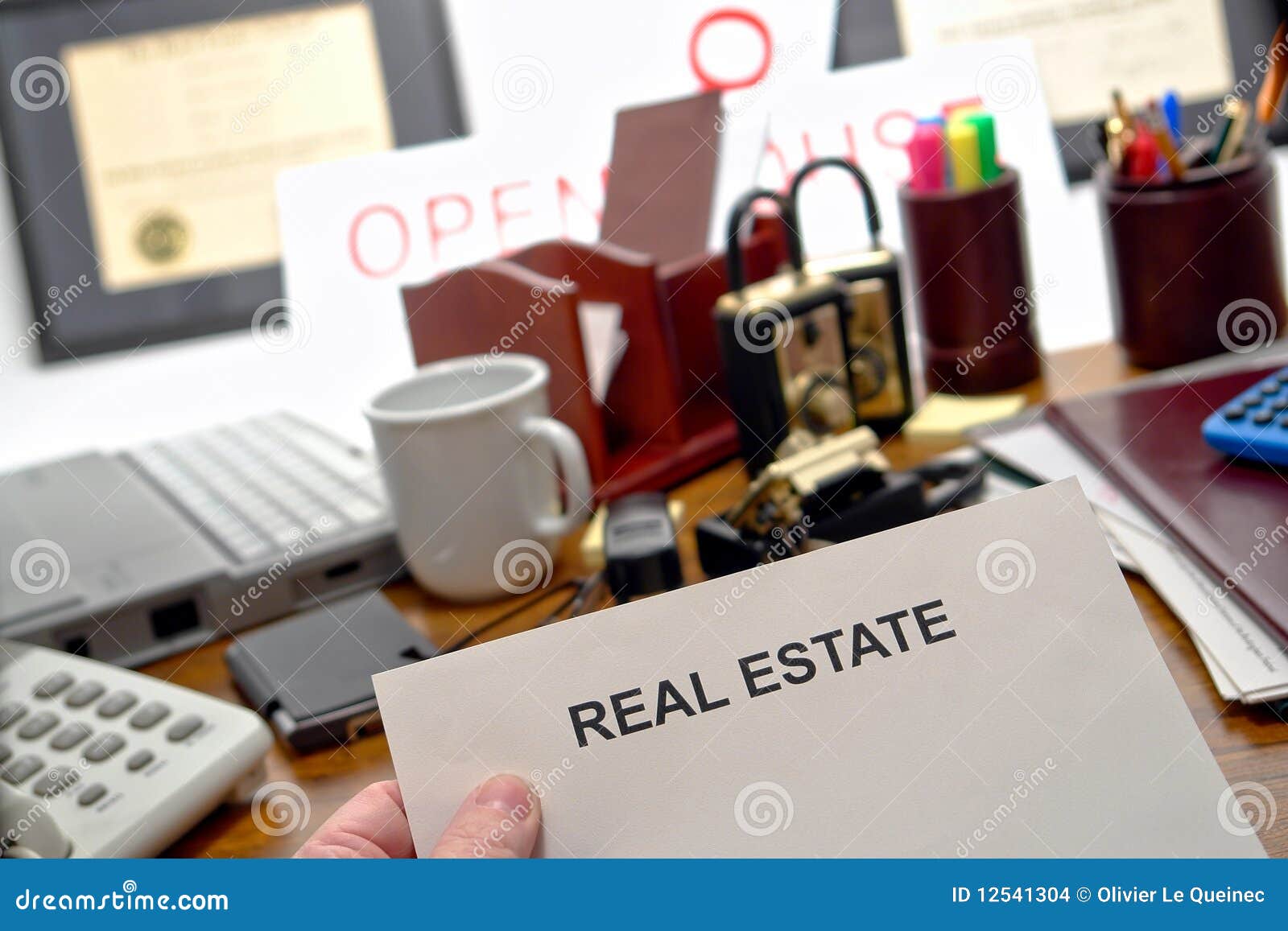 Real Estate Blank Document in Hand on Realtor Desk Stock Photo Image