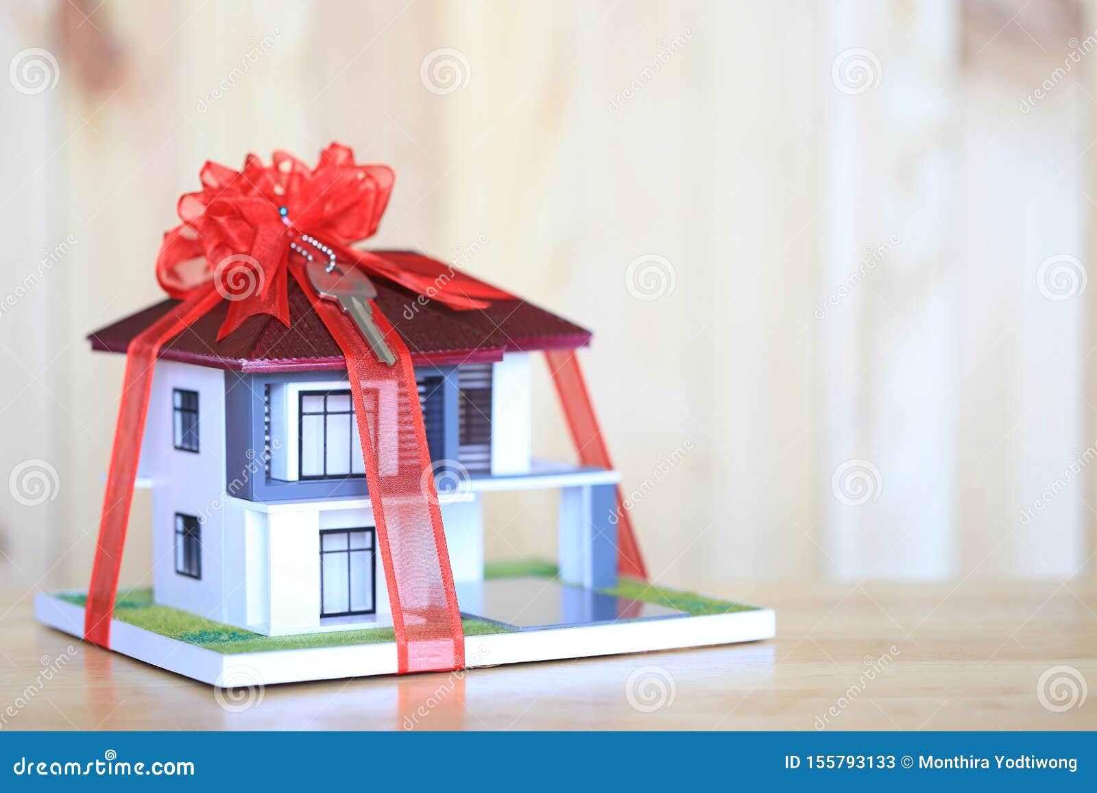 Model Of A House In Gift Box With Red Ribbon Stock Photo, Picture and  Royalty Free Image. Image 53249624.