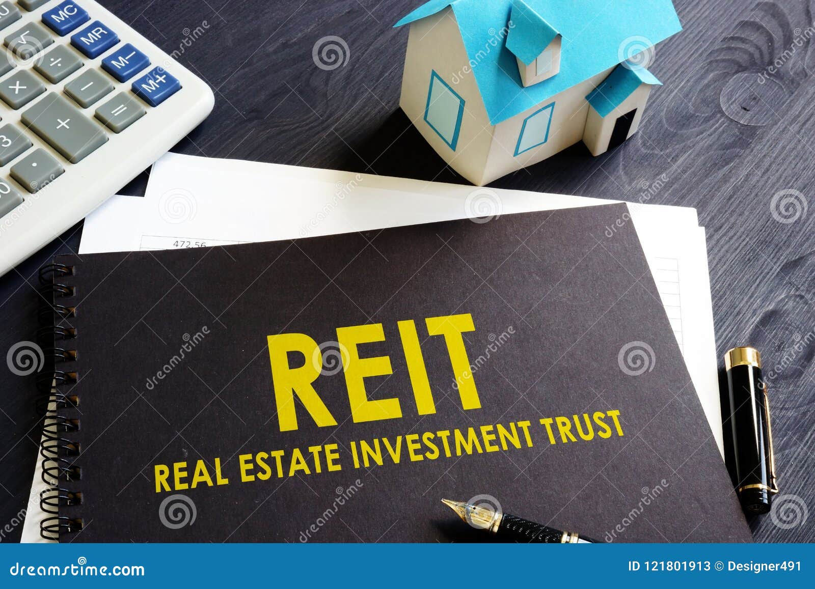 real estate investment trust reit on a desk.