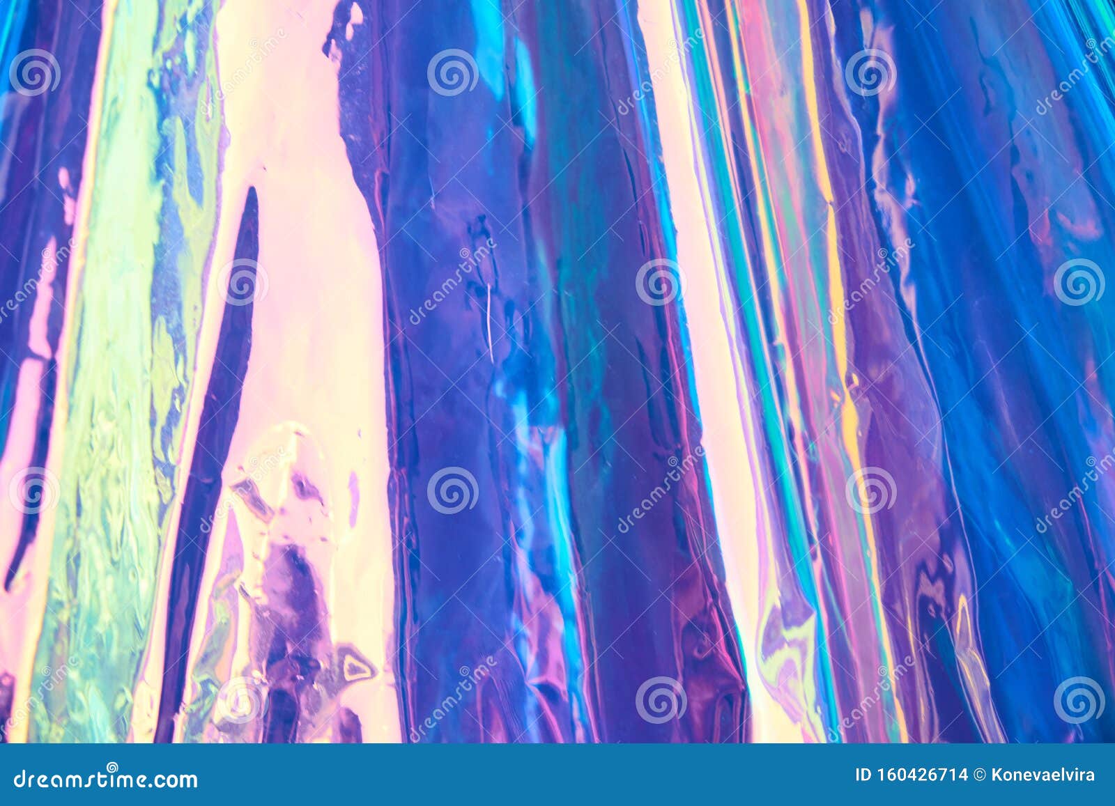 real hologram background of wrinkled abstract foil texture with multiple colors. holographic iridescent color wrinkled