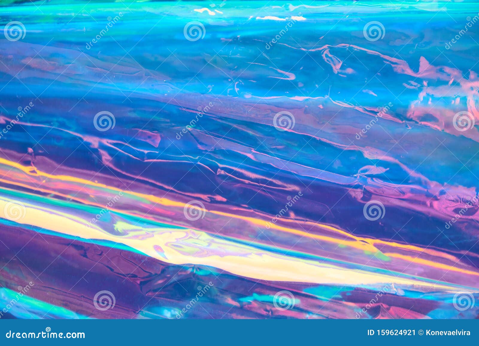 real hologram background of wrinkled abstract foil texture with multiple colors. holographic iridescent color wrinkled