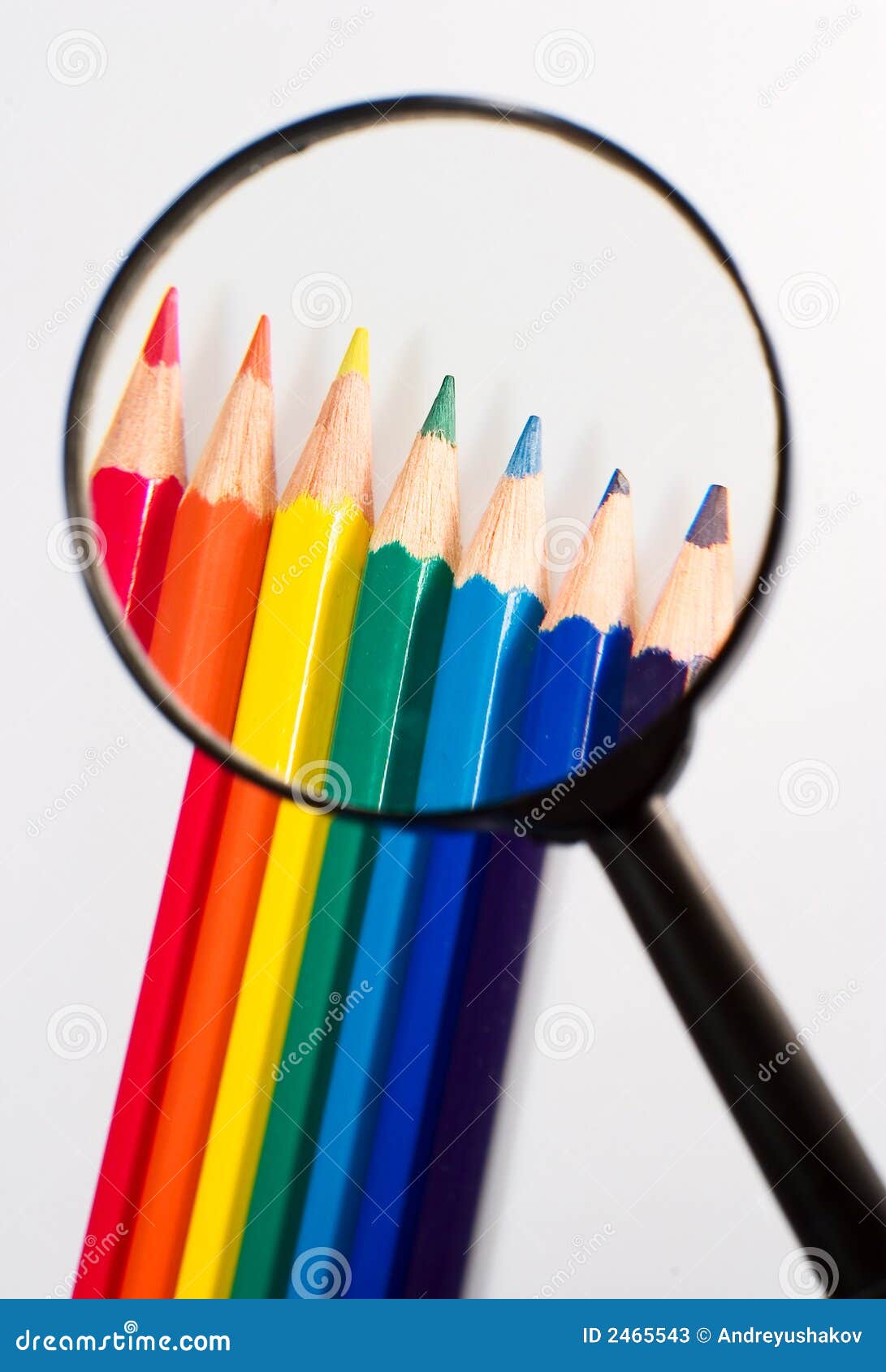 Real magnifier and pencil stock image. Image of student 2465543