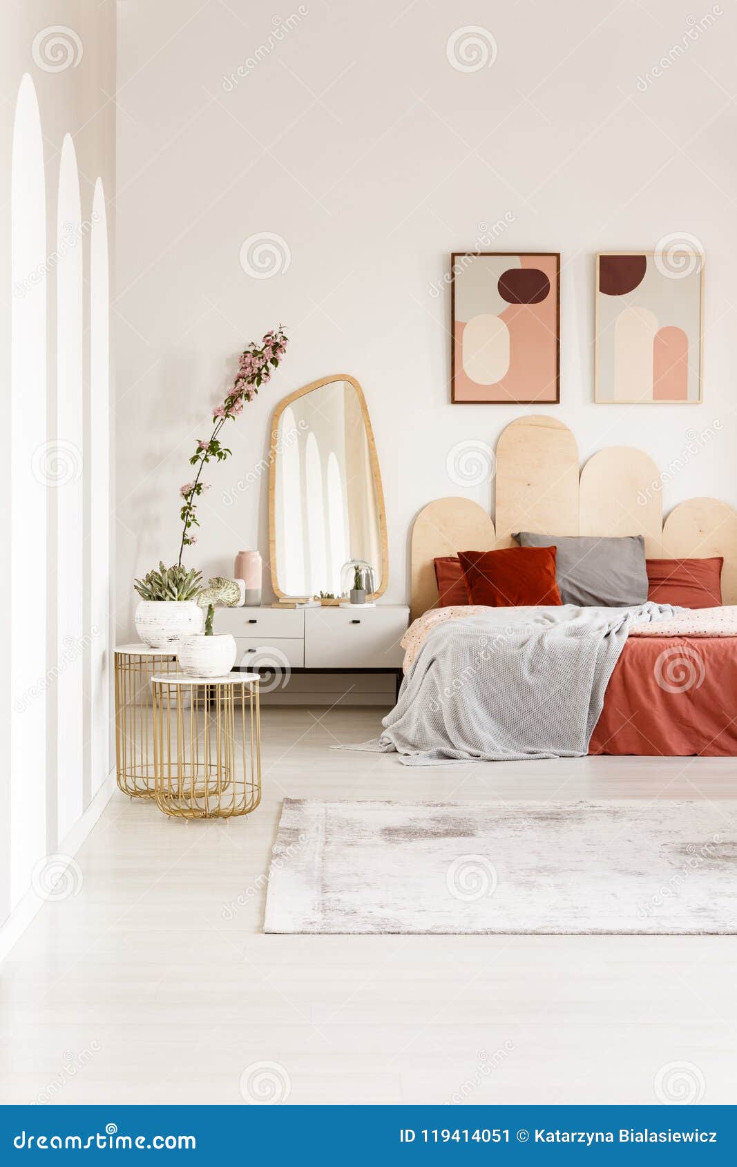 Real Photo Of A Bed With Red And White Bedding Standing Next