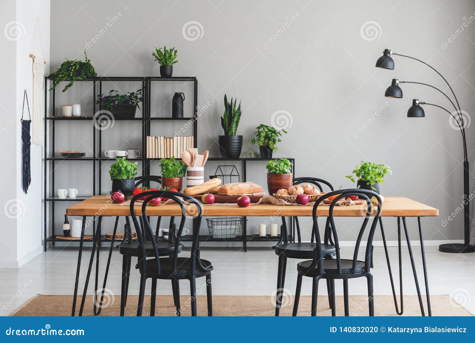 Real Photo of Cozy Dining Room Interior with a Table Full of Vegetables and  Herbs, and Black Shelf in the Background Stock Photo - Image of design,  basil: 140832020