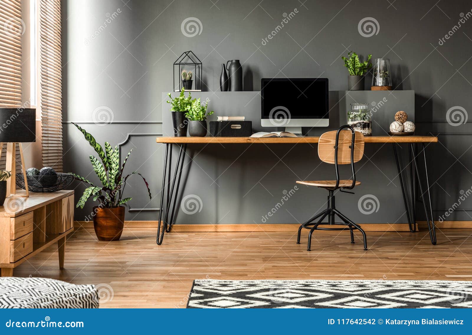 Real Photo Of A Dark Interior With Wooden Desk Chair And Computer