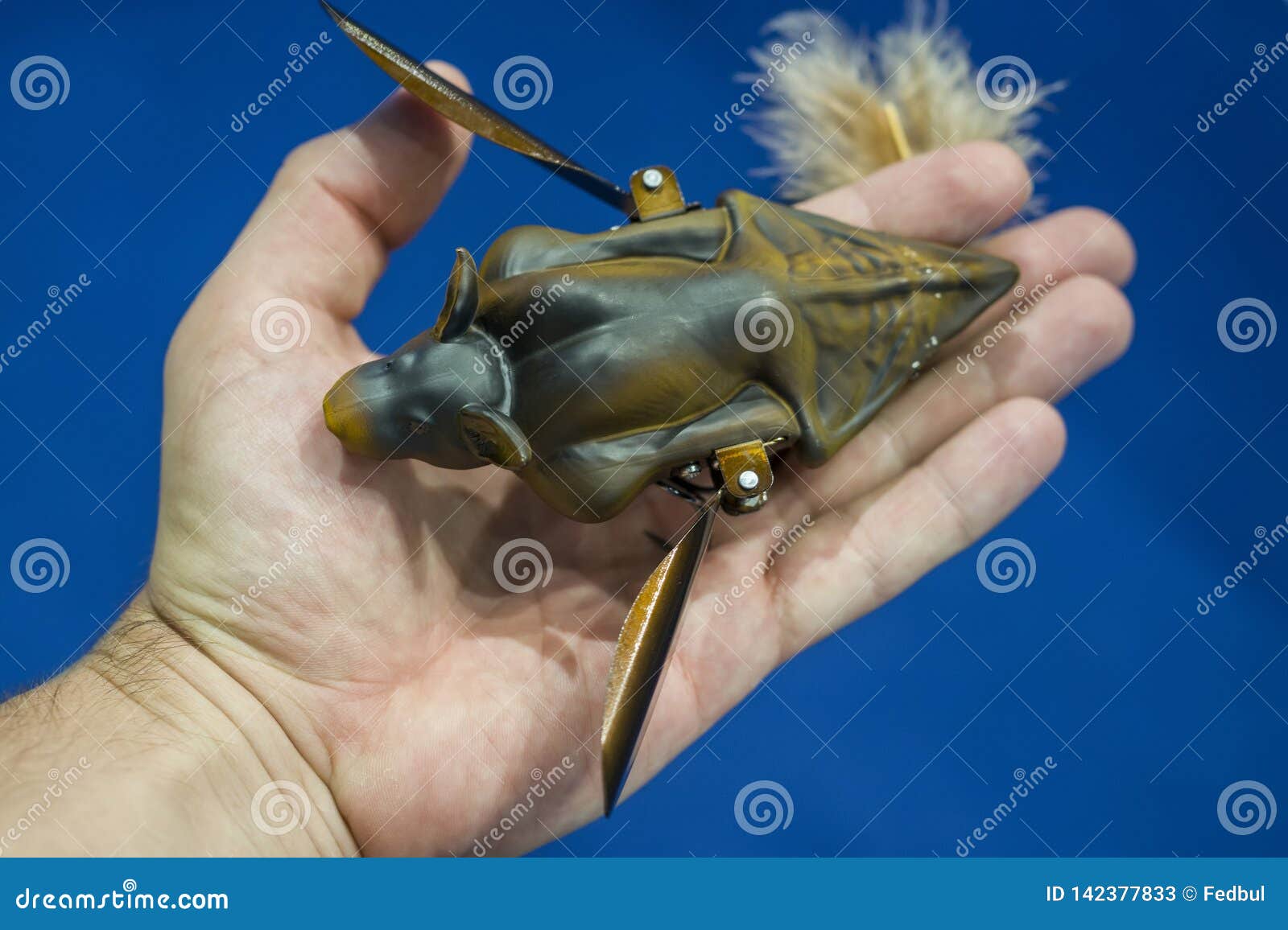 Realistic Plastic Bat Toy with Hooks in Hand Stock Image Image of