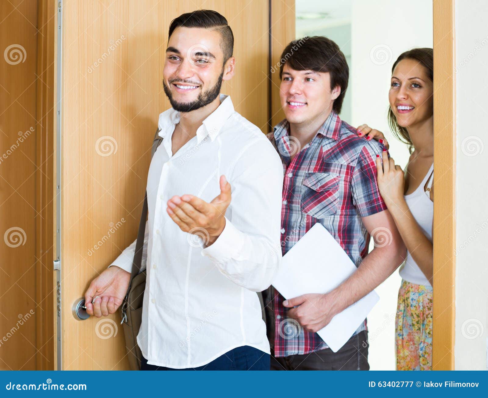 Realtor Showing New Apartment To Couple Stock Image Image Of Doorway 