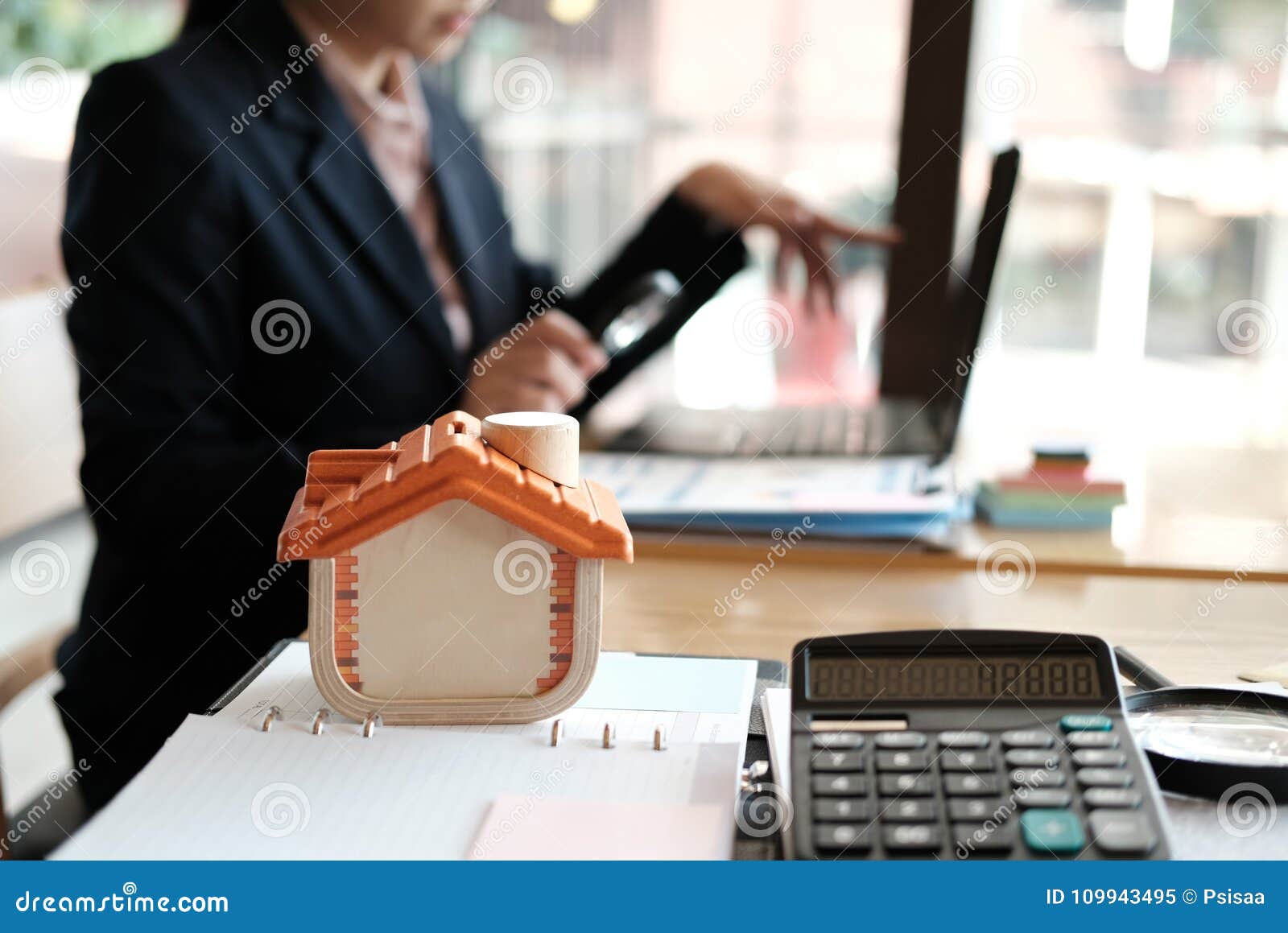 Realtor Using Computer At Office Real Estate Agent Working With