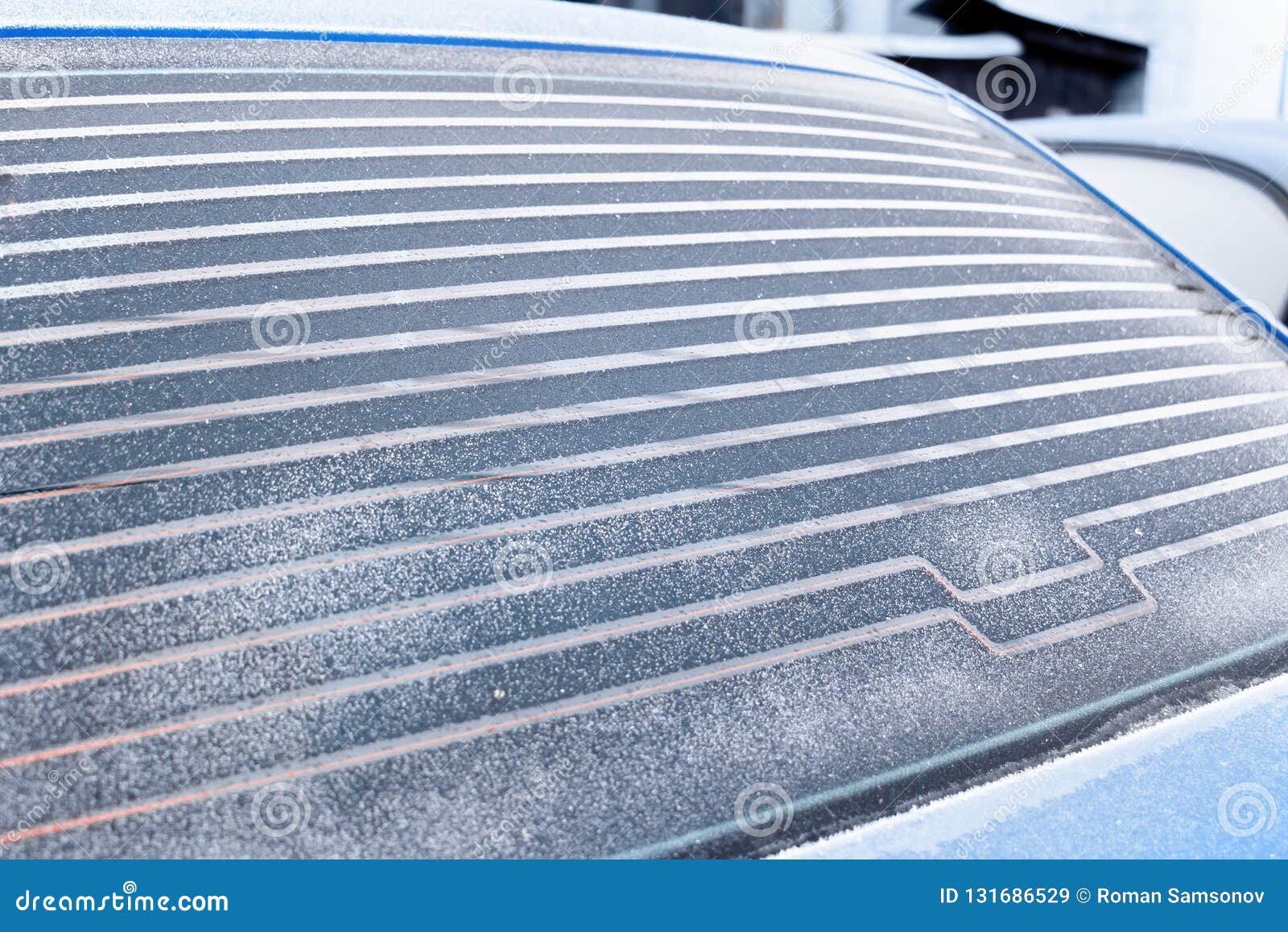 Rear Car Window Covered with Frost, Warmed Defroster Stock Image