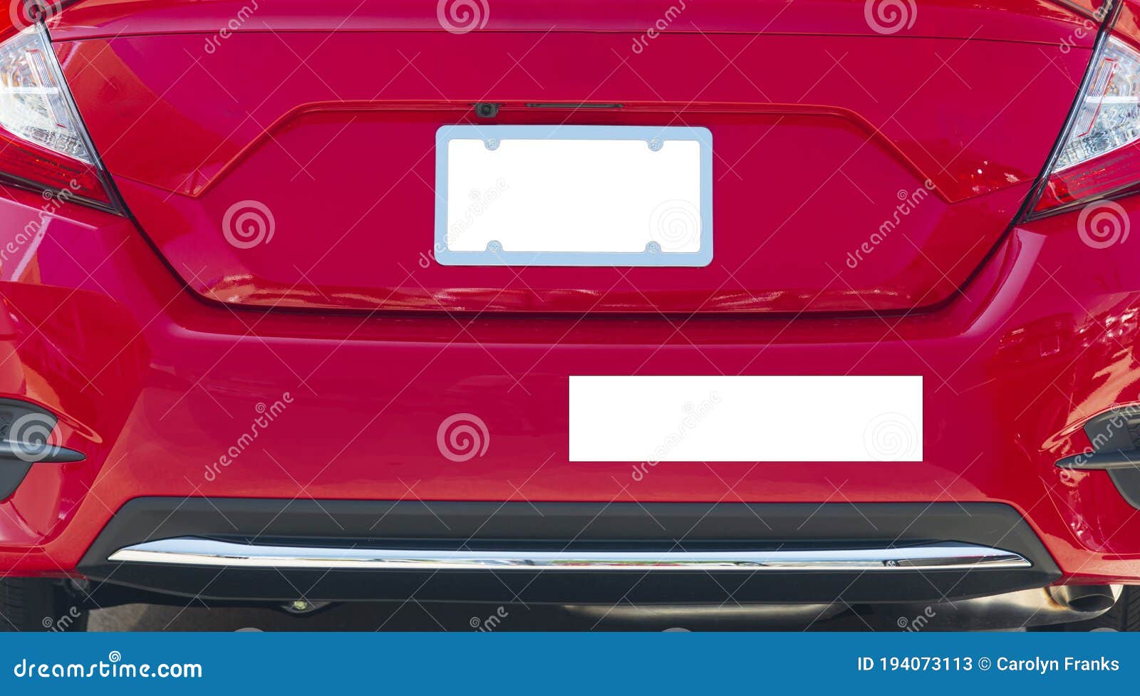 rear of red car with blank white license plate and bumper sticker