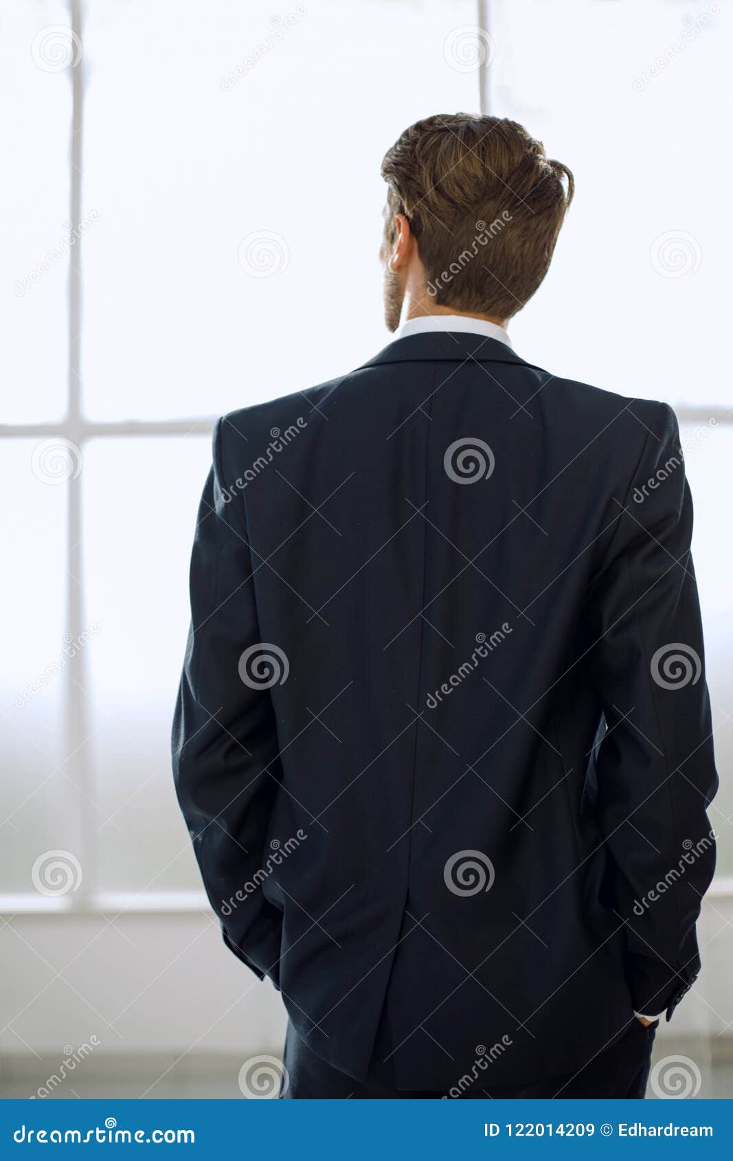 Rear View.business Man Looks Out the Office Window Stock Image - Image ...