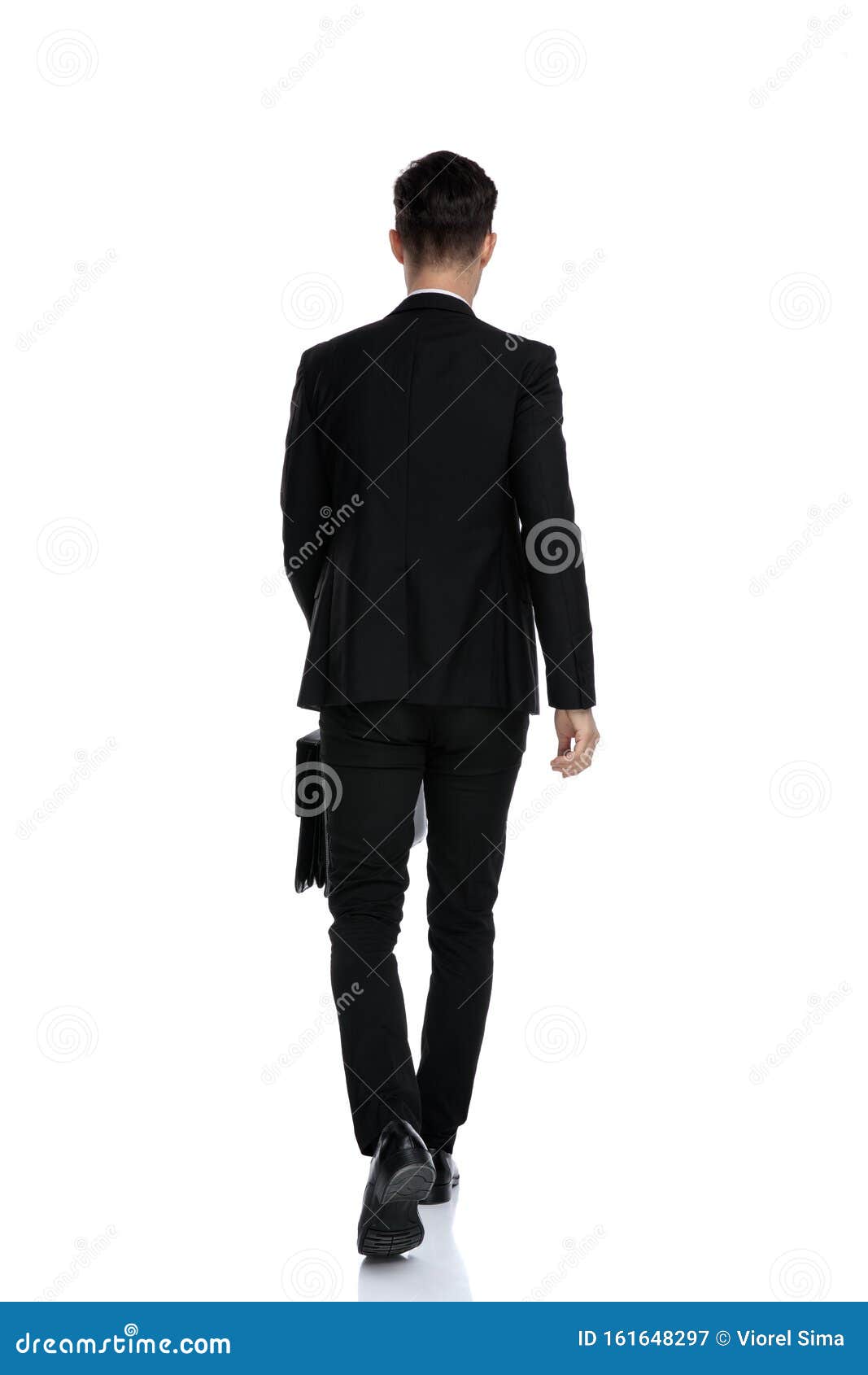 Rear View of a Confident Businessman Holding a Briefcase Stock Image ...