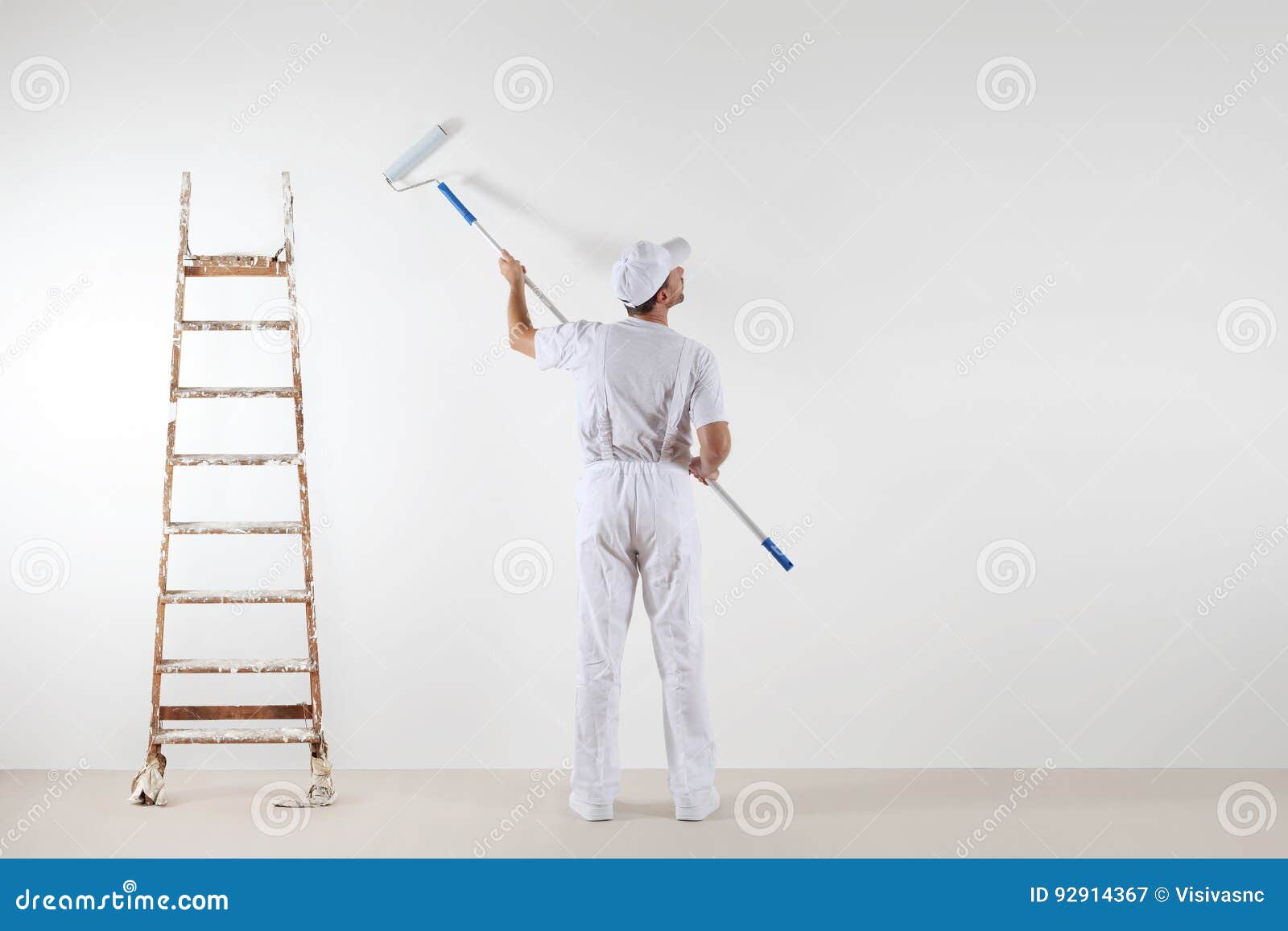 Rear View of Painter Man Looking at Blank Wall, with Paint Stick Stock  Image - Image of improvement, professional: 92914367