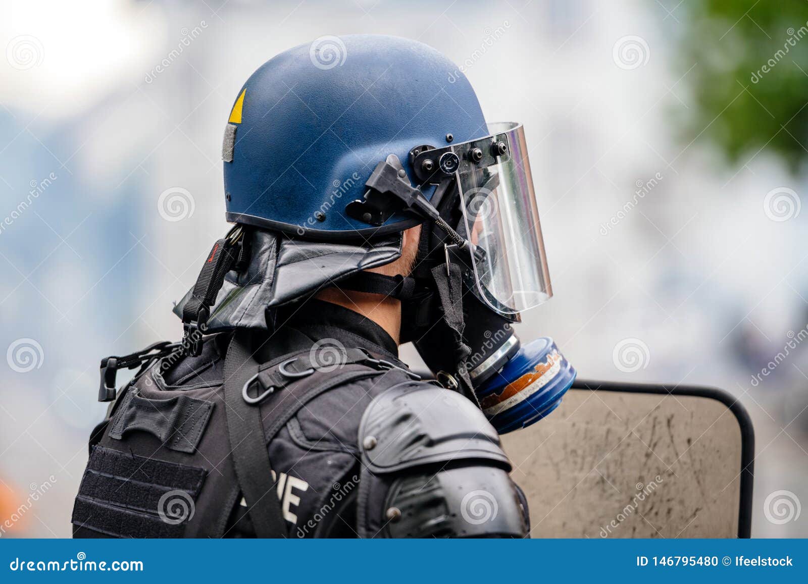 Rear View of Police Officer Wearing Gas Tear Gas Mask Stock Photo ...