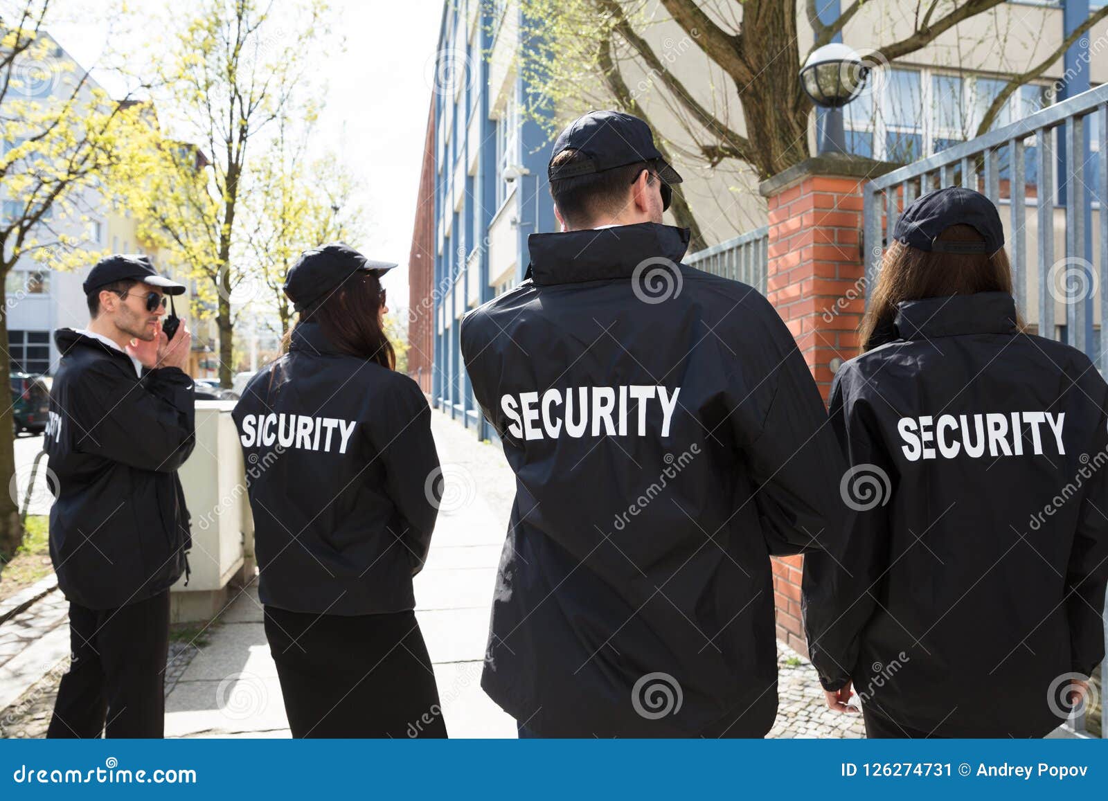 security guards standing outside building