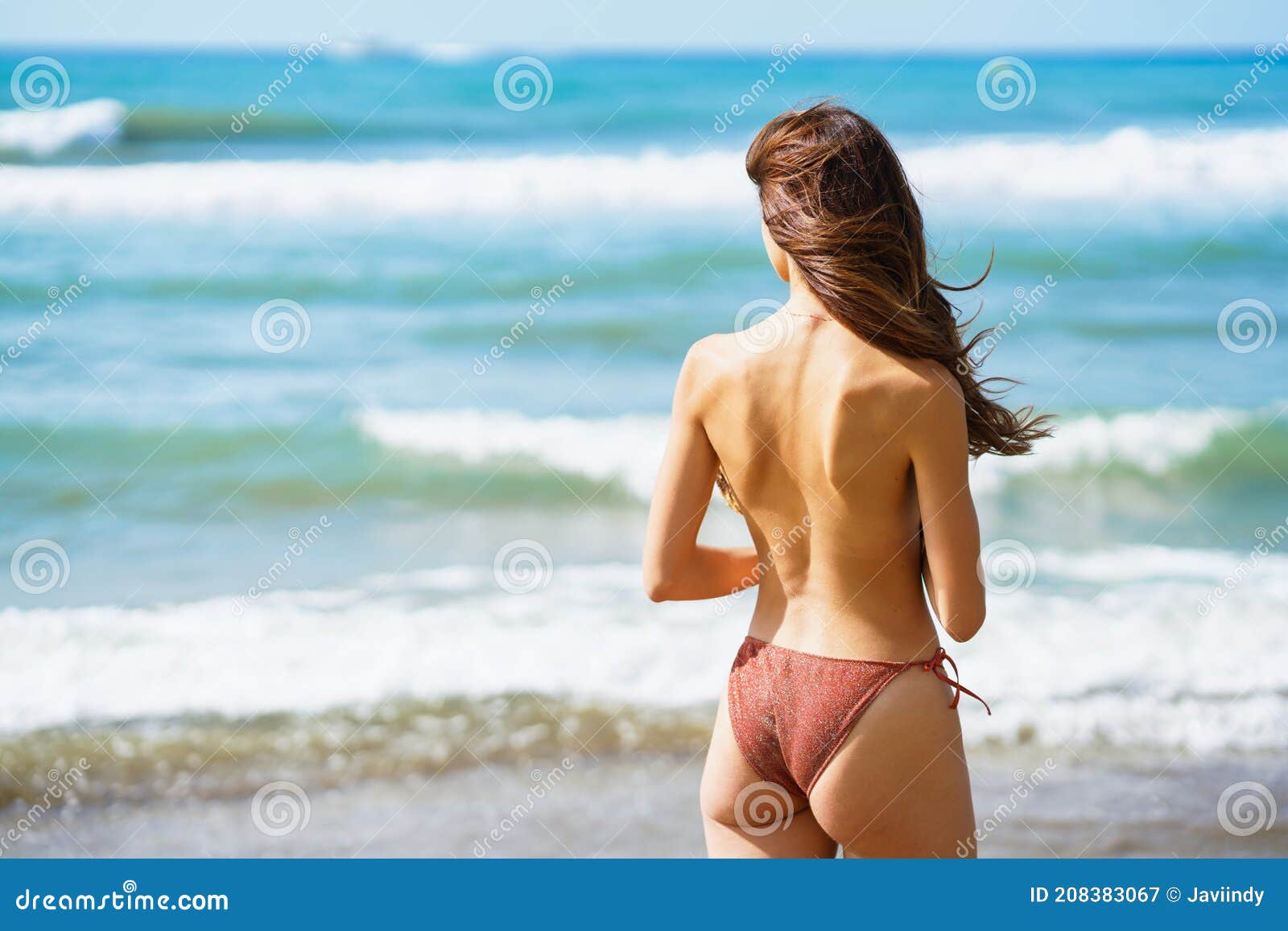 Topless Women At The Beach