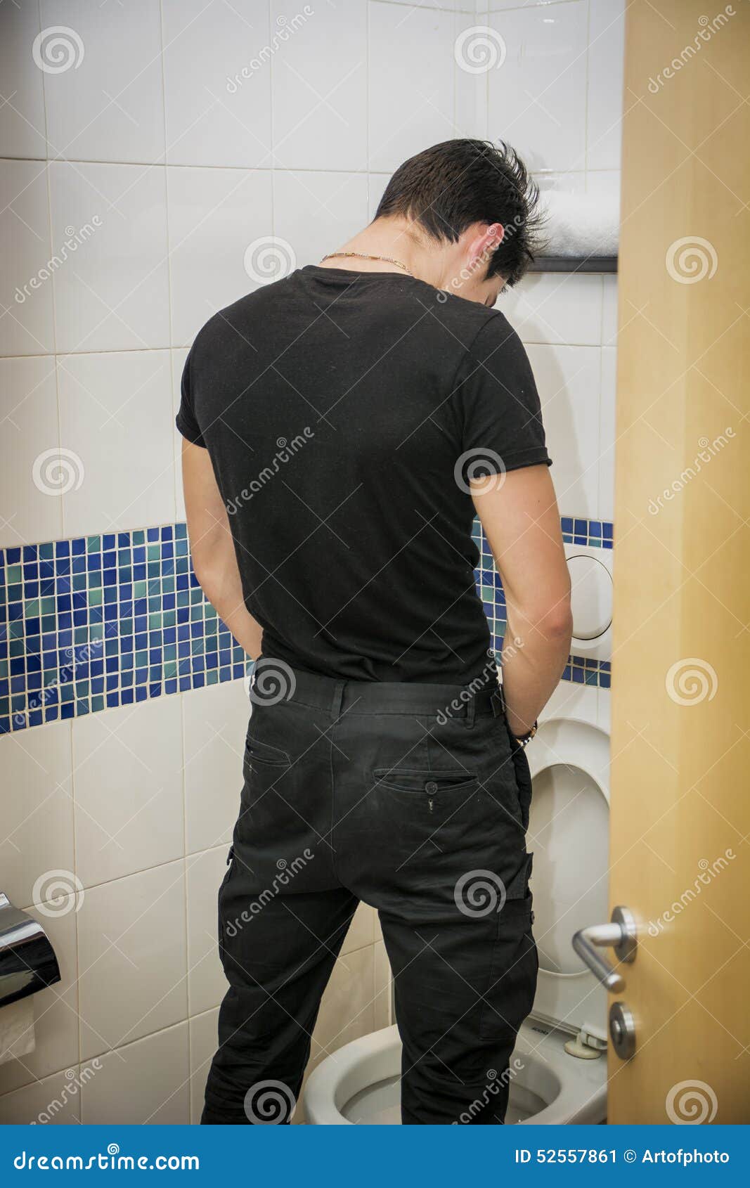 old men peeing in the toilet
