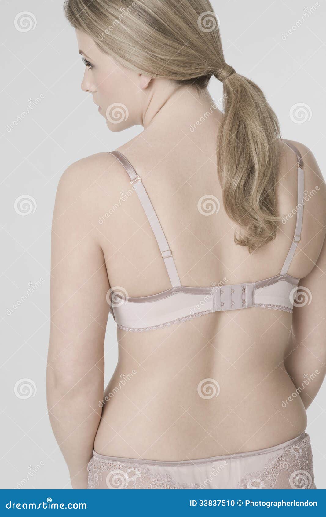 Download Rear View Of Young Woman In Underwear Stock Photo - Image ...