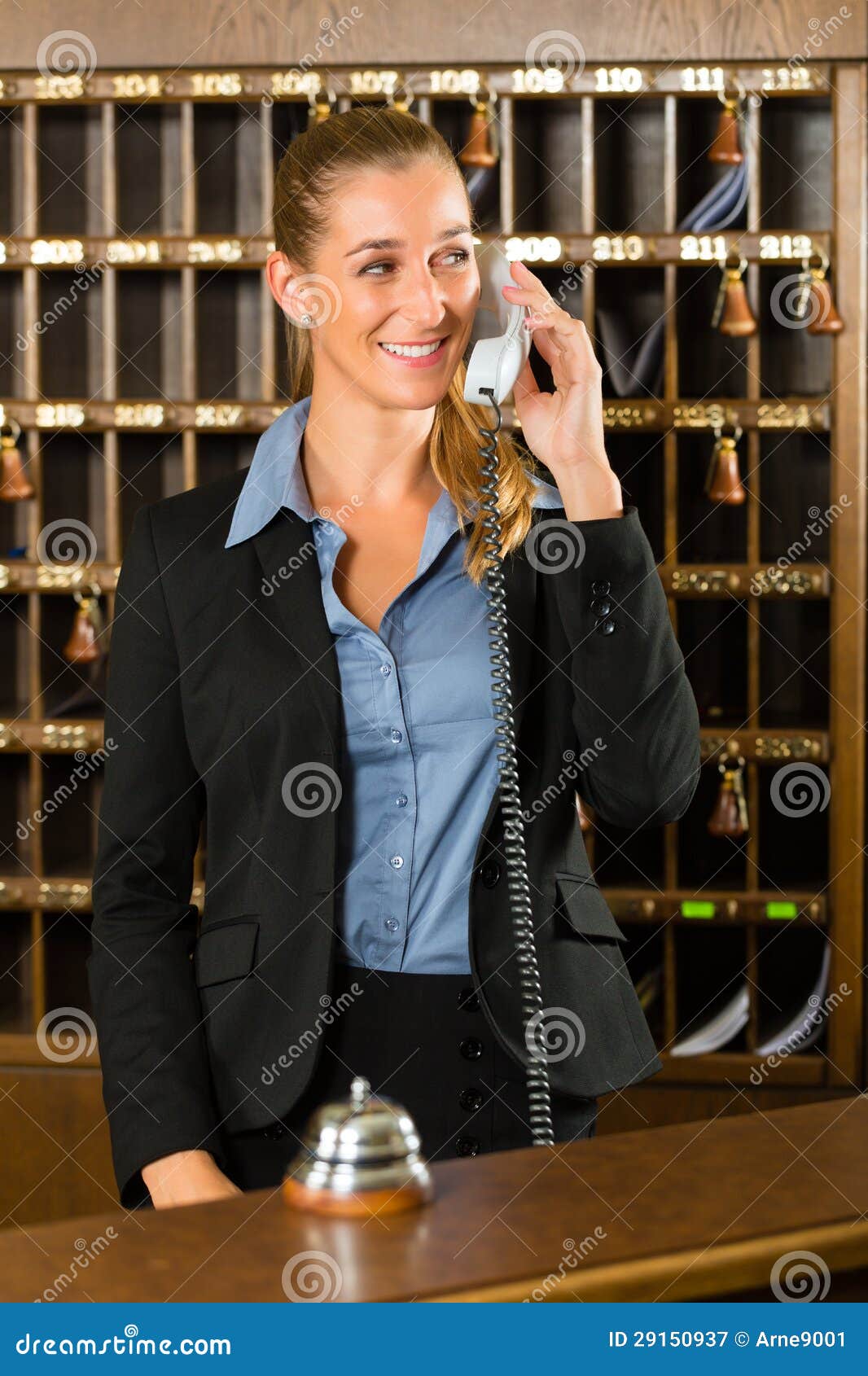 Reception Of Hotel Desk Clerk Taking A Call Stock Image Image
