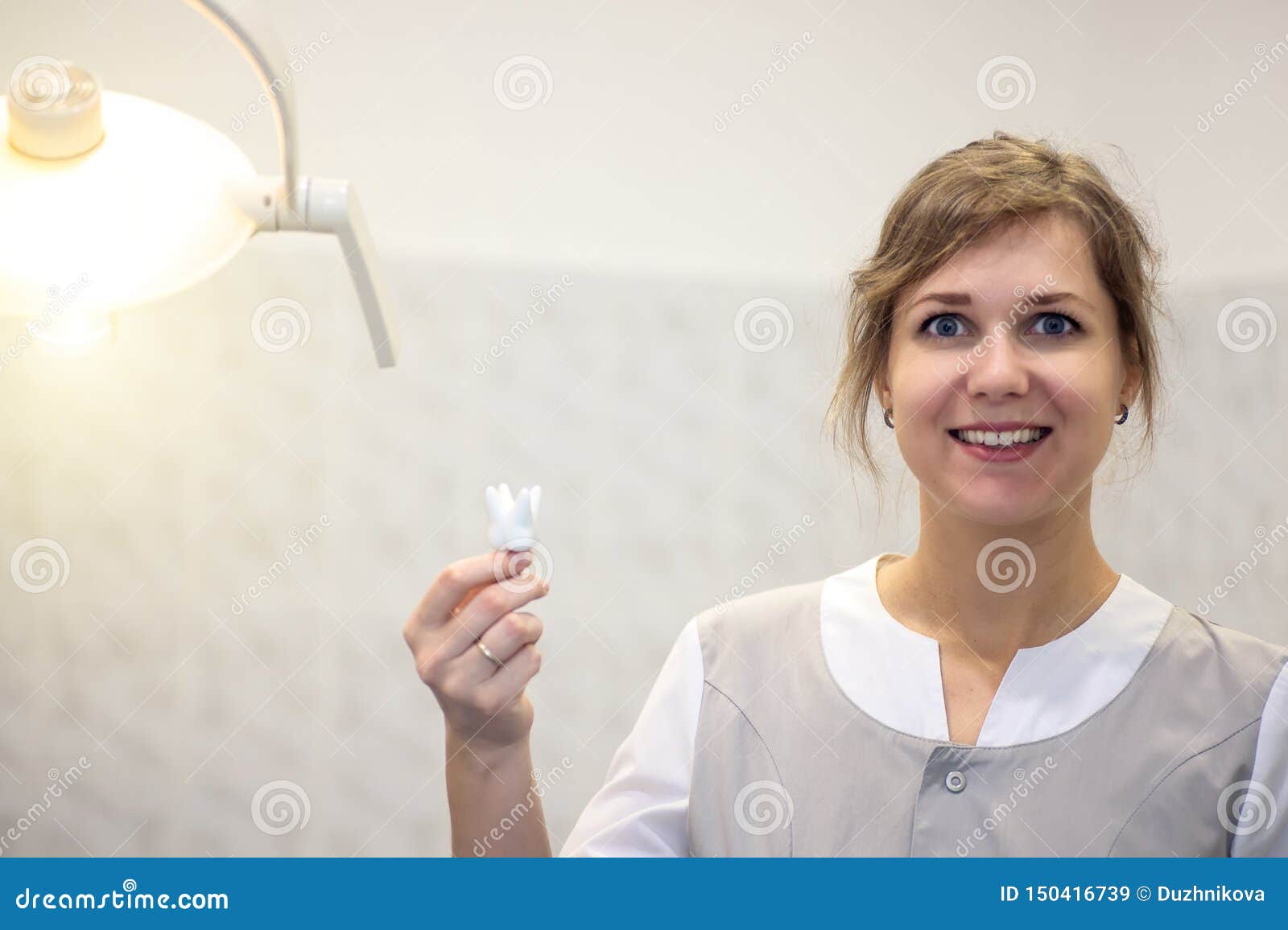 A Reception in the Office of the Dentist, the Doctor Shows the Training